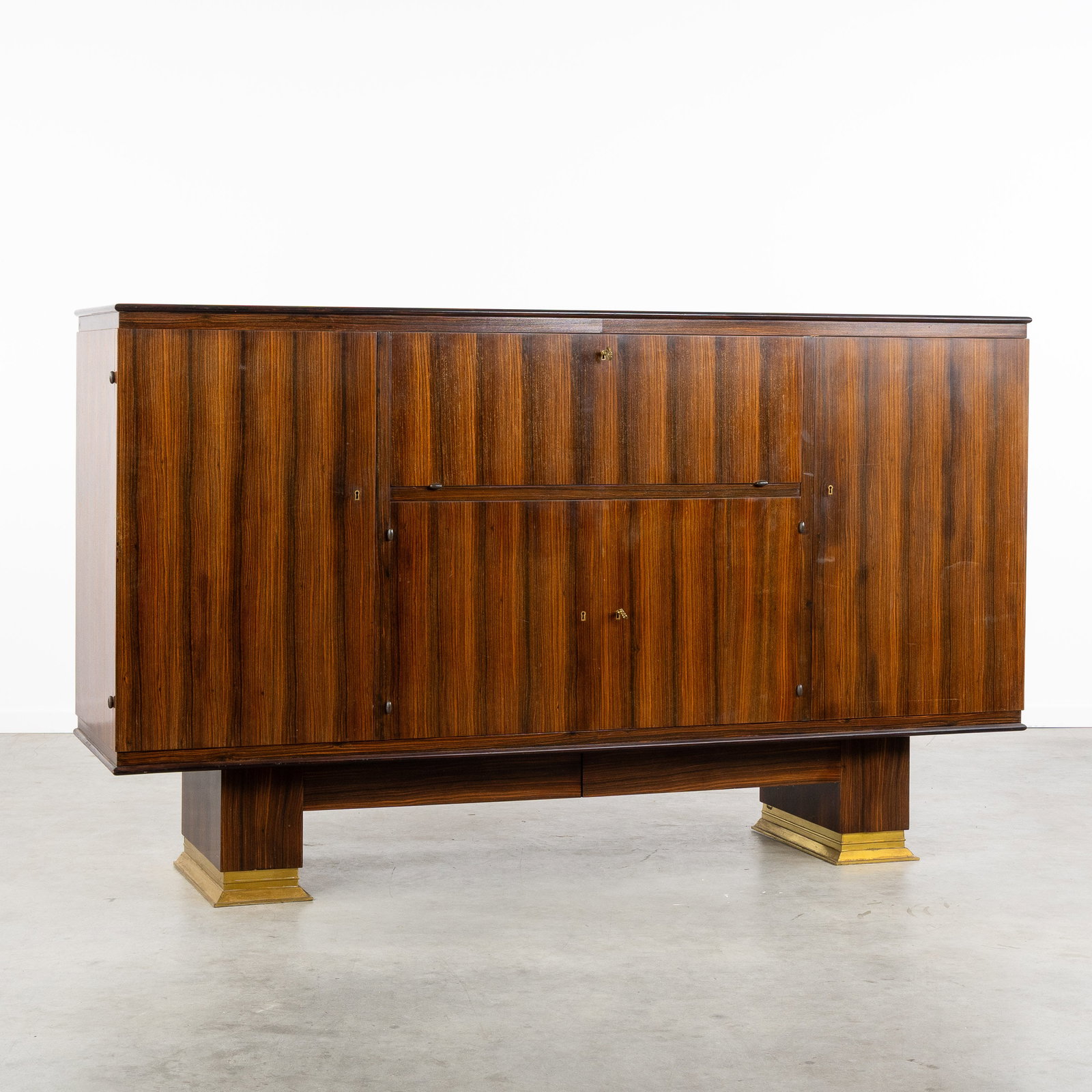 An Art Deco dresser or sideboard, rosewood and bronze, probably De Coene, Kortrijk, circa 1940. (1 of 8)