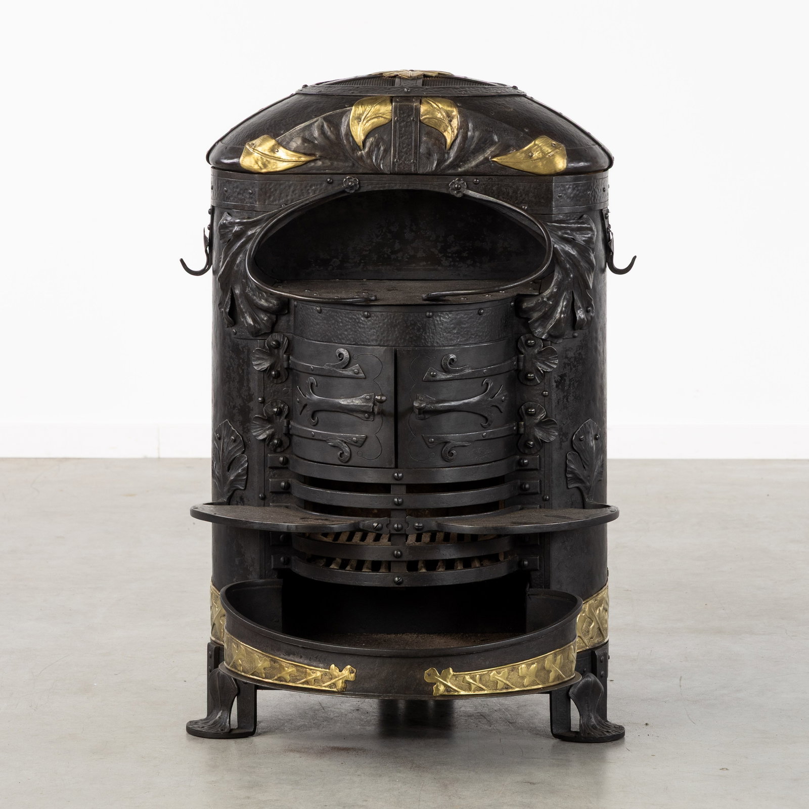 An Exceptional Art Nouveau stove, patinated wrought iron and brass, circa 1900. (1 of 8)
