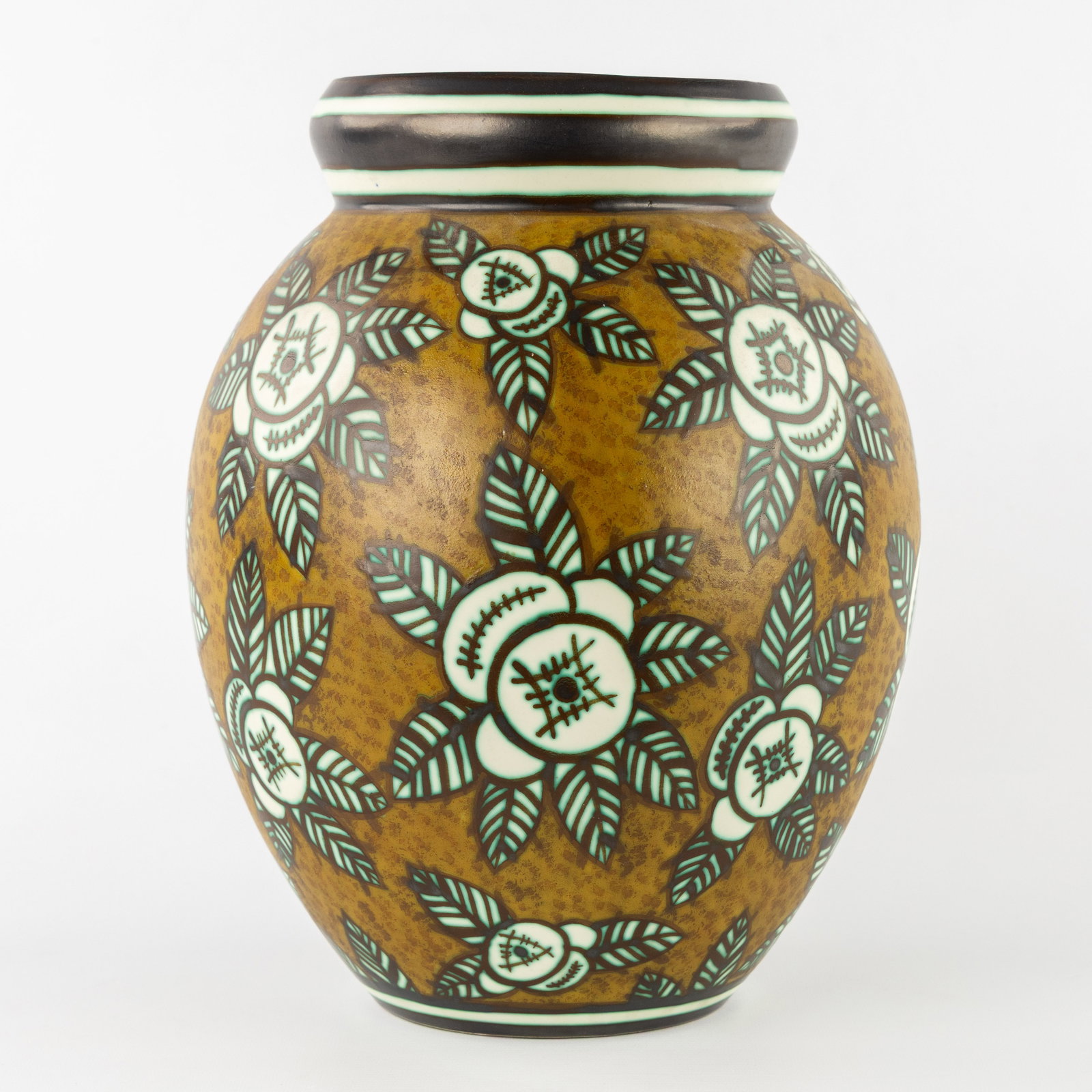 Charles Catteau (1880–1966) ‘Vase with a three-colour design with stylised floral motifs',: Charles Catteau (1880–1966) 'Vase with a three-colour design with stylised floral motifs', glazed ceramic for Boch Keramis. Three-colour design with stylised floral motifs. Signed C. Catteau. Marked