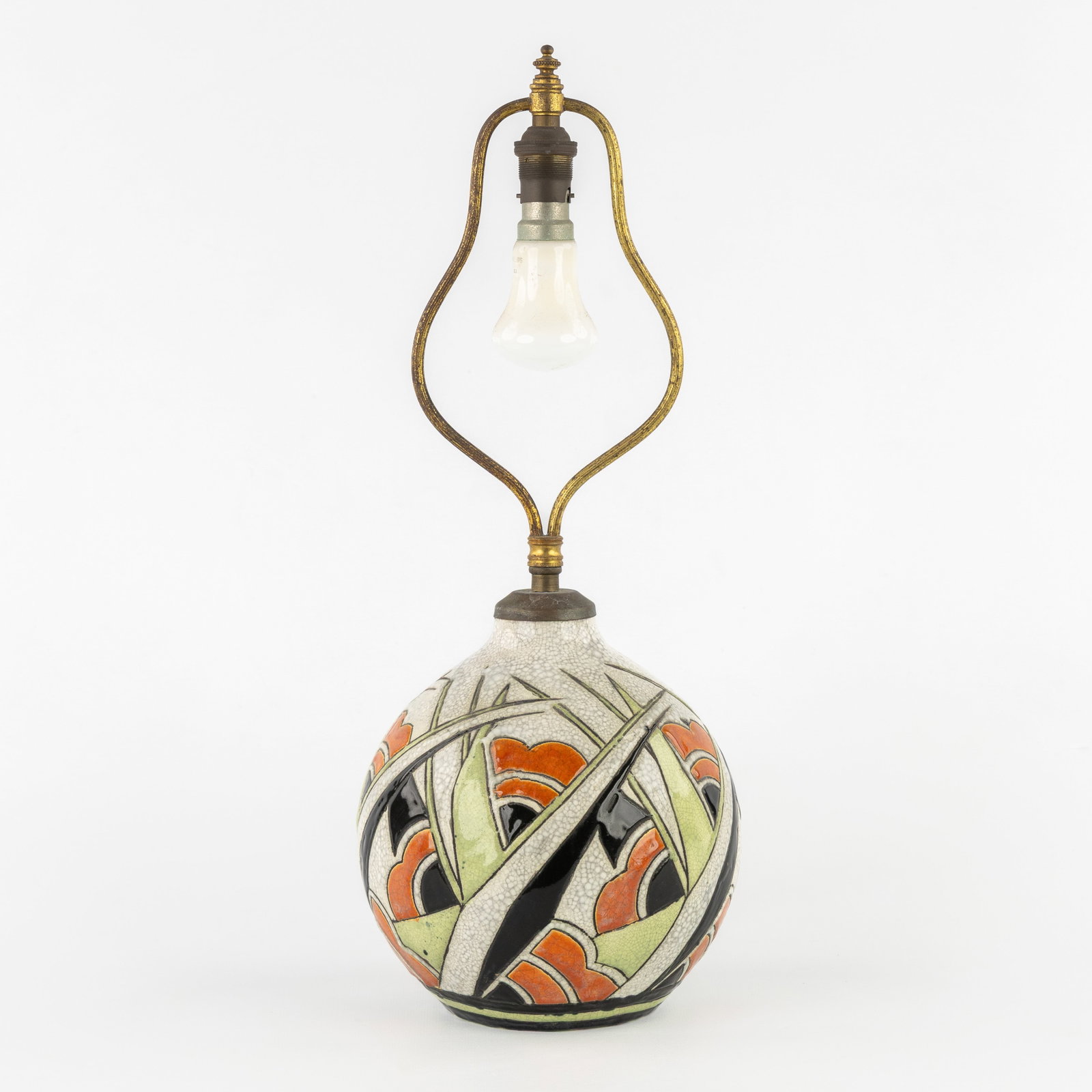 Charles Catteau (1880–1966) A table lamp: ‘Polychrome design with floral motifs', glazed: Charles Catteau (1880–1966) A table lamp: 'Polychrome design with floral motifs', glazed ceramics for Boch Keramis. A vase: ' Dimensions: (W:17 x H:45,5 cm) The absence of a condition report do