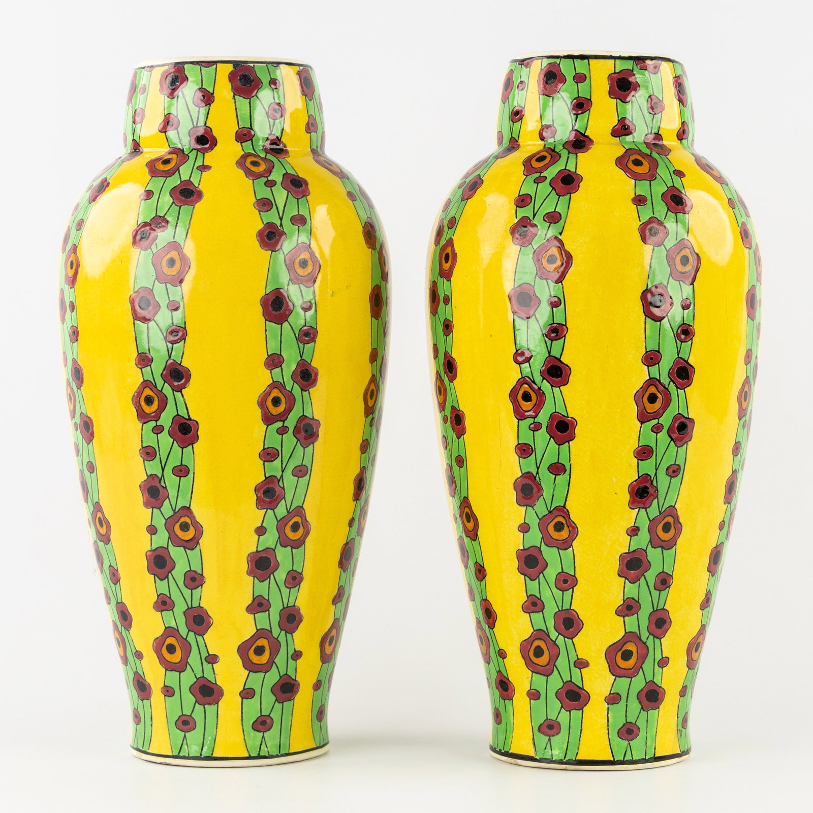 Charles Catteau (1880–1966) ‘A pair of vases: polychrome design with stylised flowers', glazed (1 of 6)