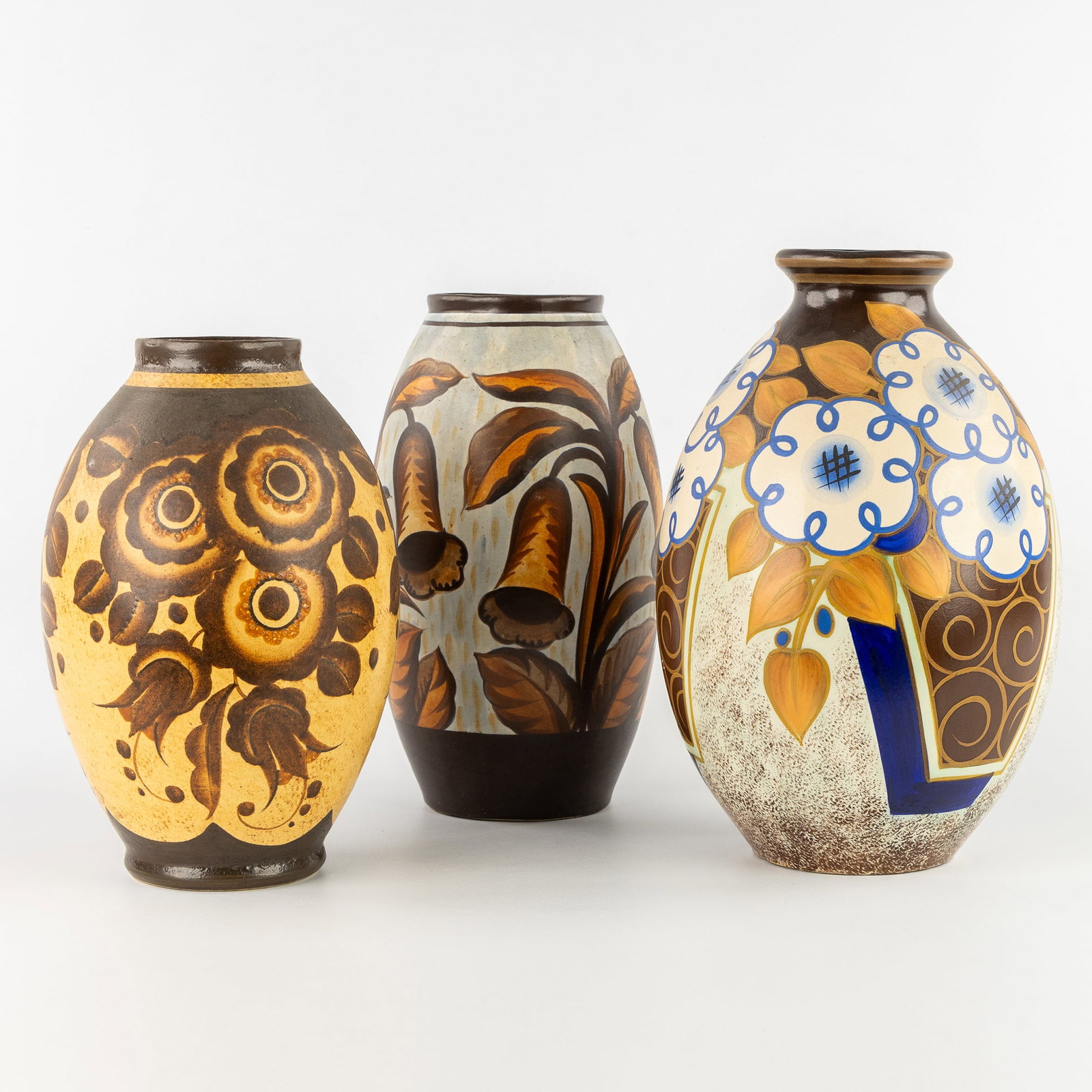 Charles Catteau (1880–1966) ‘Three vases: Polychrome design with stylised flowers', glazed (1 of 10)