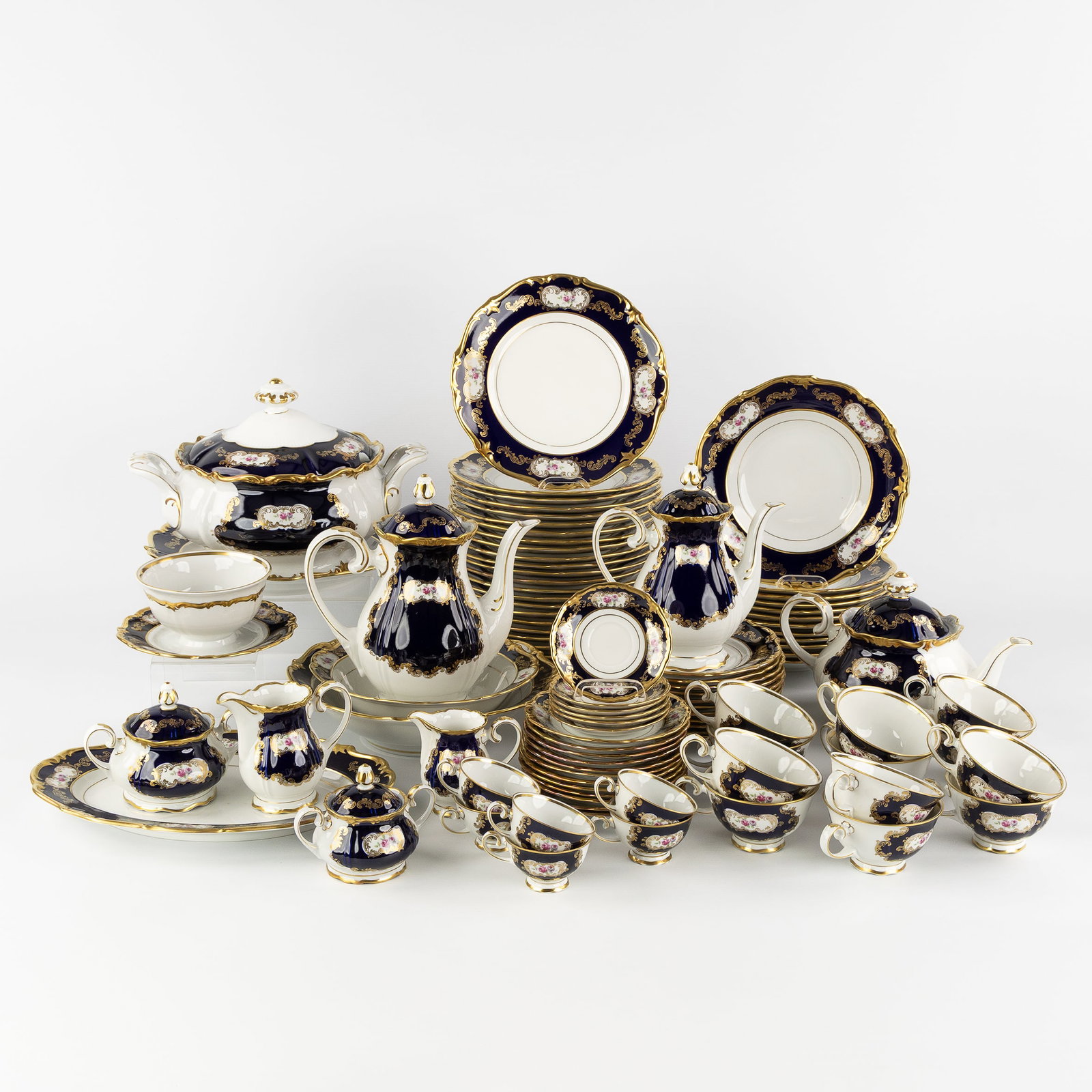 Reichenbach, a 95-piece porcelain dinner service, cobalt blue with gilded finish, Germany. (1 of 16)