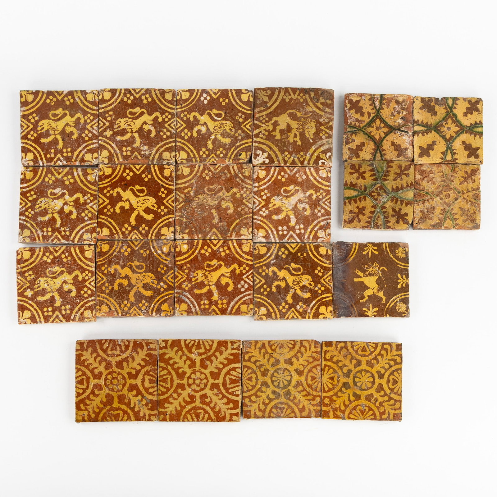 21 medieval-style tiles with rampant lions and patterns, Flanders, 18th century. (1 of 5)