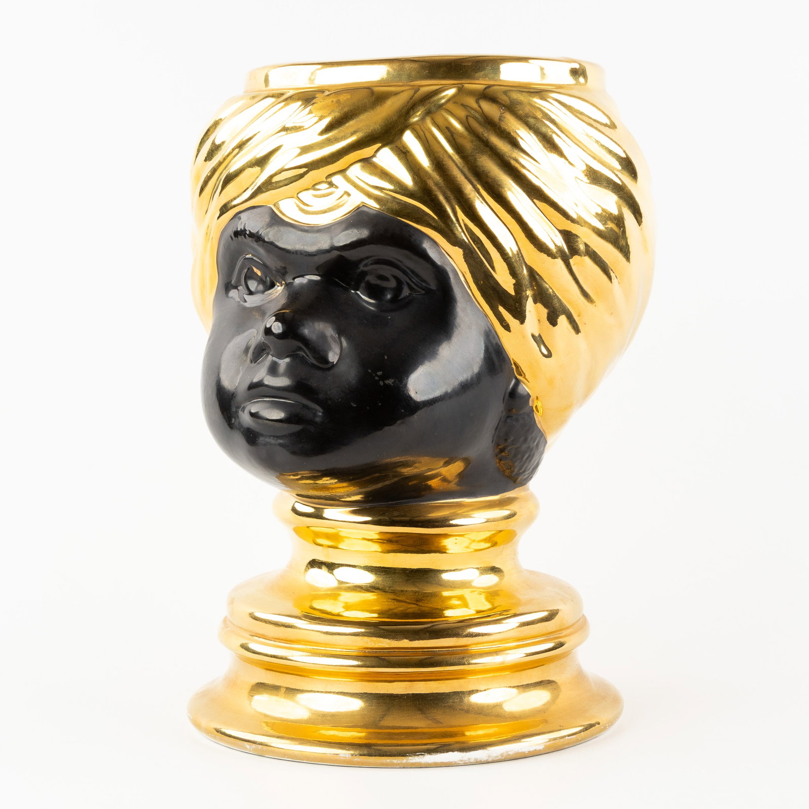 An Italian Blackamoor jardinière or 'Testa di Moro' vase, gilded ceramic, in the style of Piero (1 of 7)