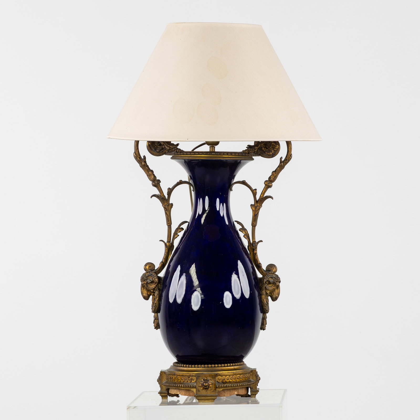 A Table lamp, cobalt blue glazed ceramic and bronze, decorated with ram's heads, 19th and 20th (1 of 8)
