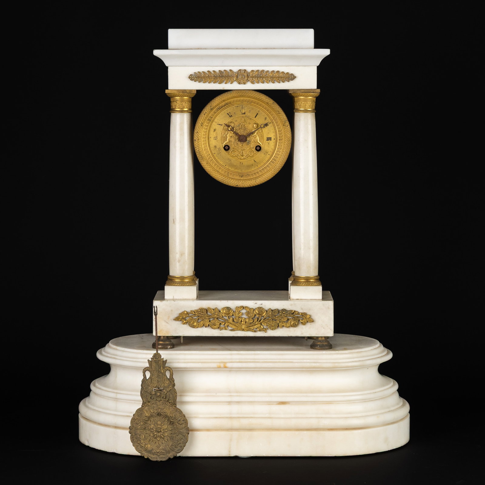 A Column clock, Empire style, Carrara marble and gilded bronze, mounted on a marble base, France, (1 of 13)