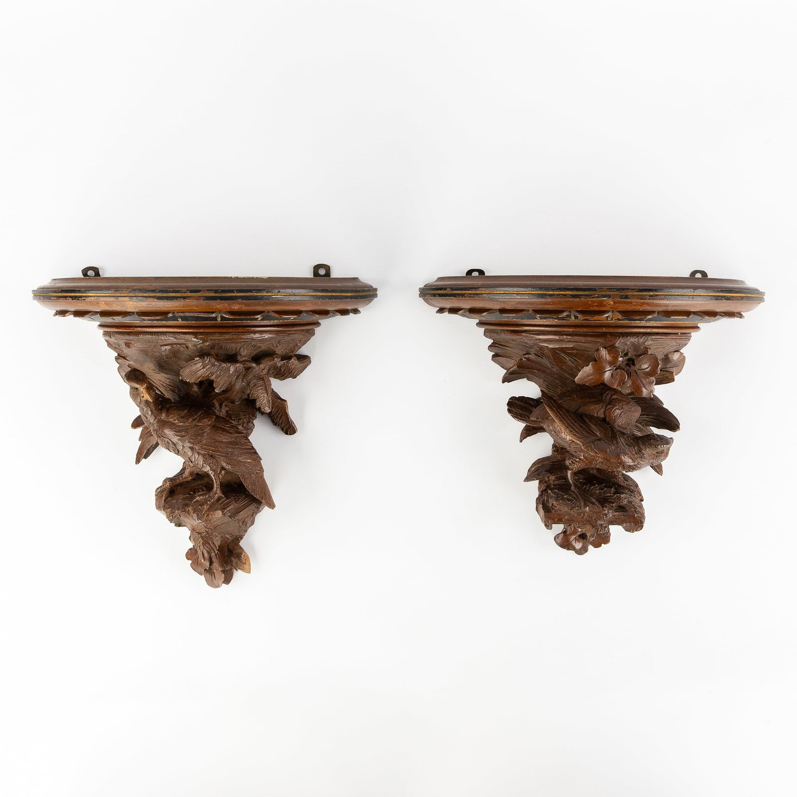 A Pair of wood-sculptured wall consoles with birds, Black Forest, circa 1900. (1 of 17)