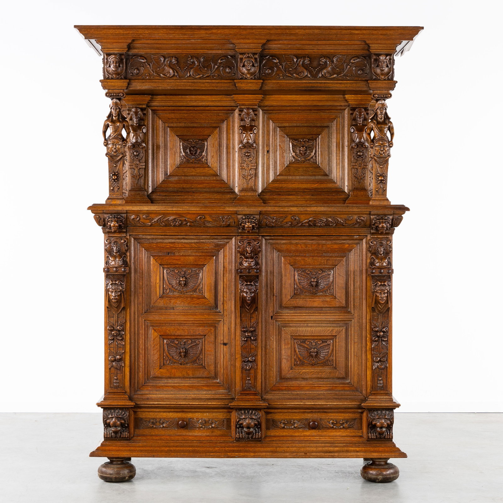 A Bahut, richly sculptured oak with lion heads and atlantes, Neo-Renaissance, 19th C. (1 of 14)