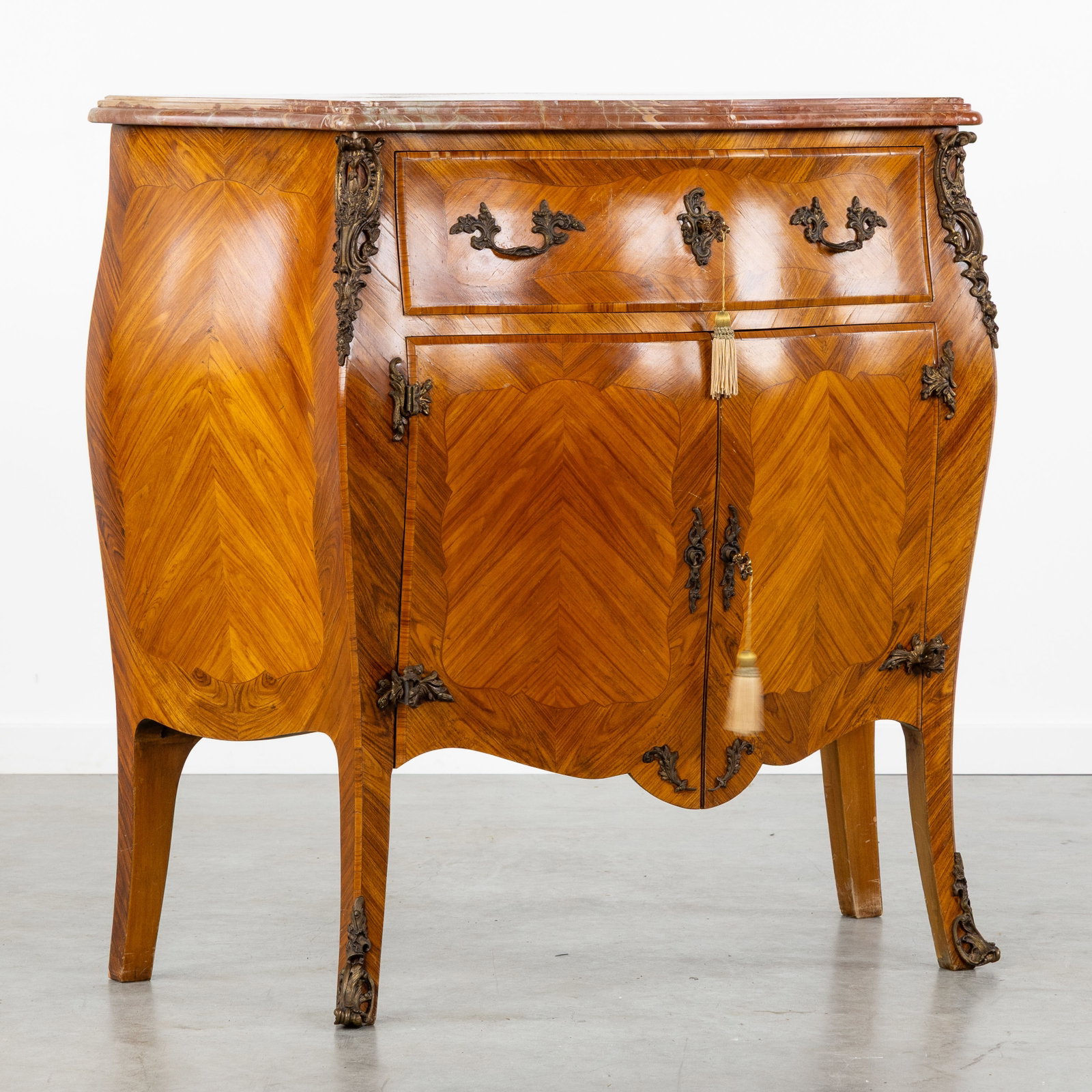 A Commode with a Marble top, Louis XV style, parquetry and bronze fittings. (1 of 10)
