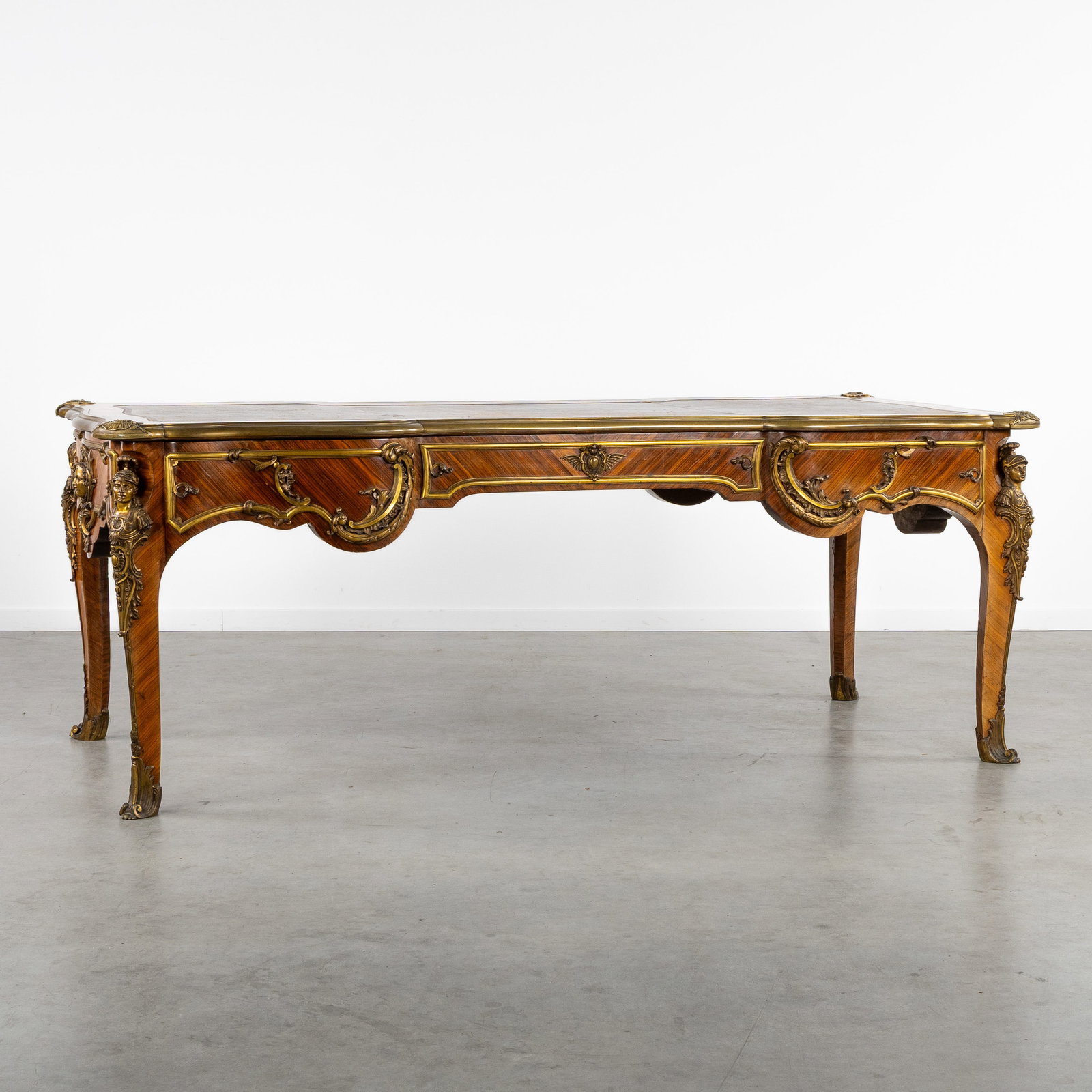 An Exceptional desk or 'Bureau plat', Rosewood and Kingwood veneer, richly mounted with bronze, (1 of 10)
