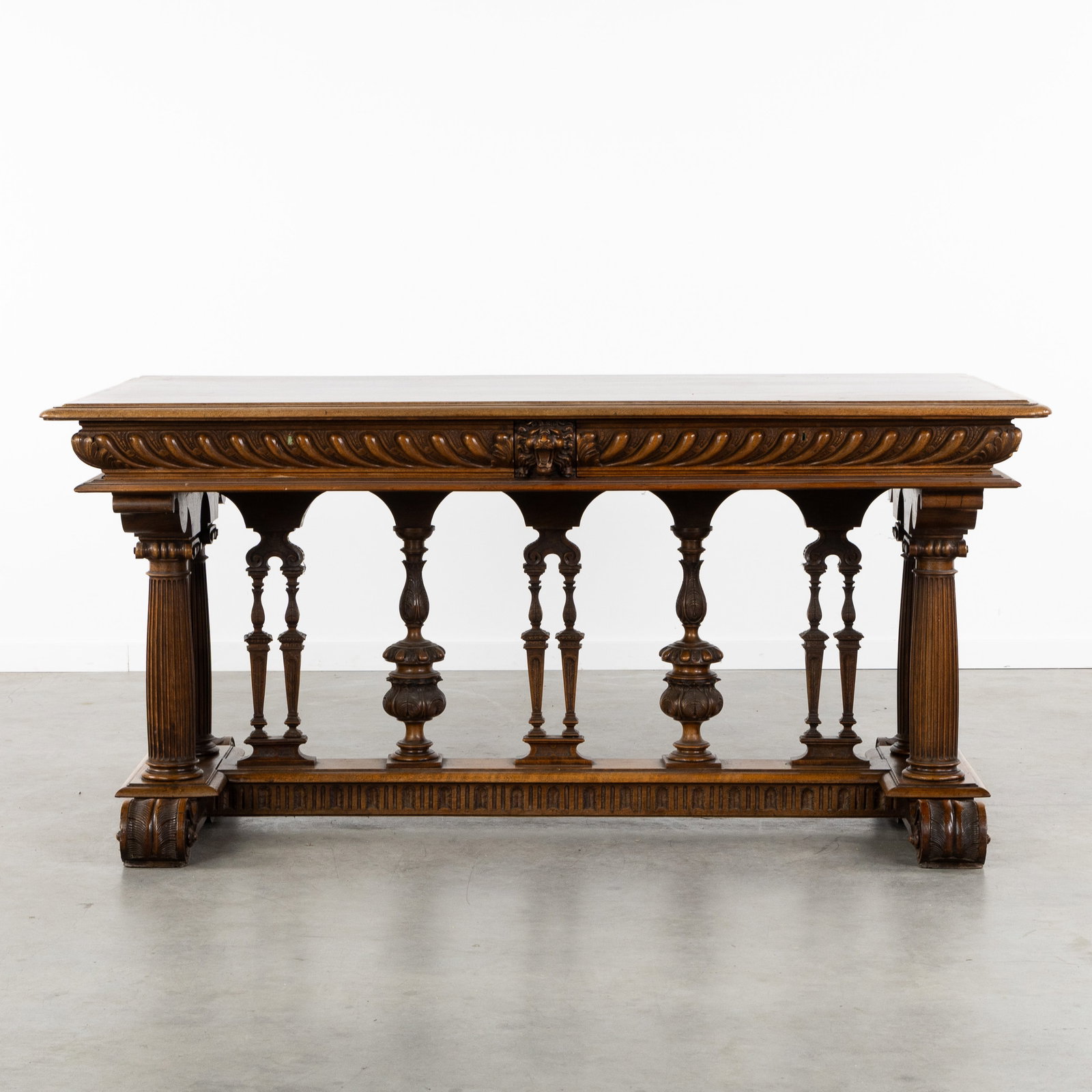 A Finely sculptured walnut desk with two drawers, Renaissance Revival, 19th C. (1 of 8)