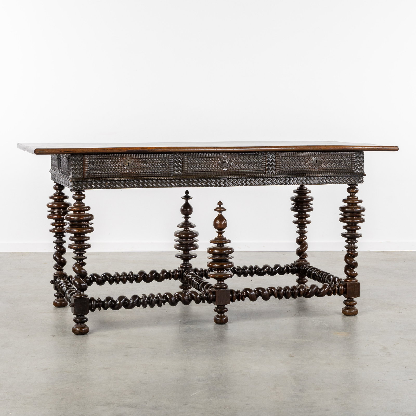 An Antique Portuguese table with a Solomonic twisted base, finely sculptured frieze, and walnut (1 of 7)