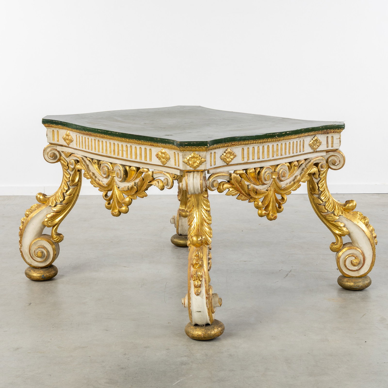 A Richly sculptured monumental table, gilded and patinated wood, English Palladian style. (1 of 8)