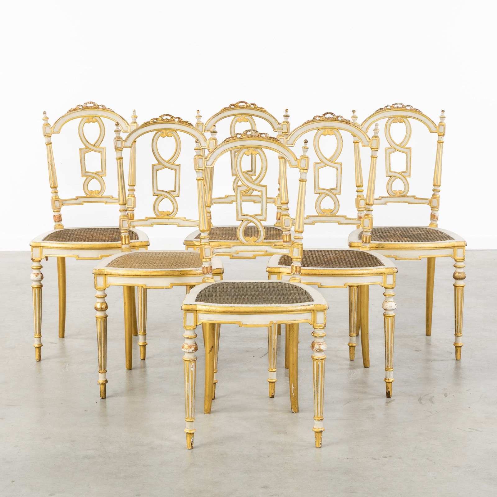 Thurn und Taxis Collection, Sankt Emmeram, a set of 6 elegant Louis XVI chairs, gilded and patinated (1 of 6)