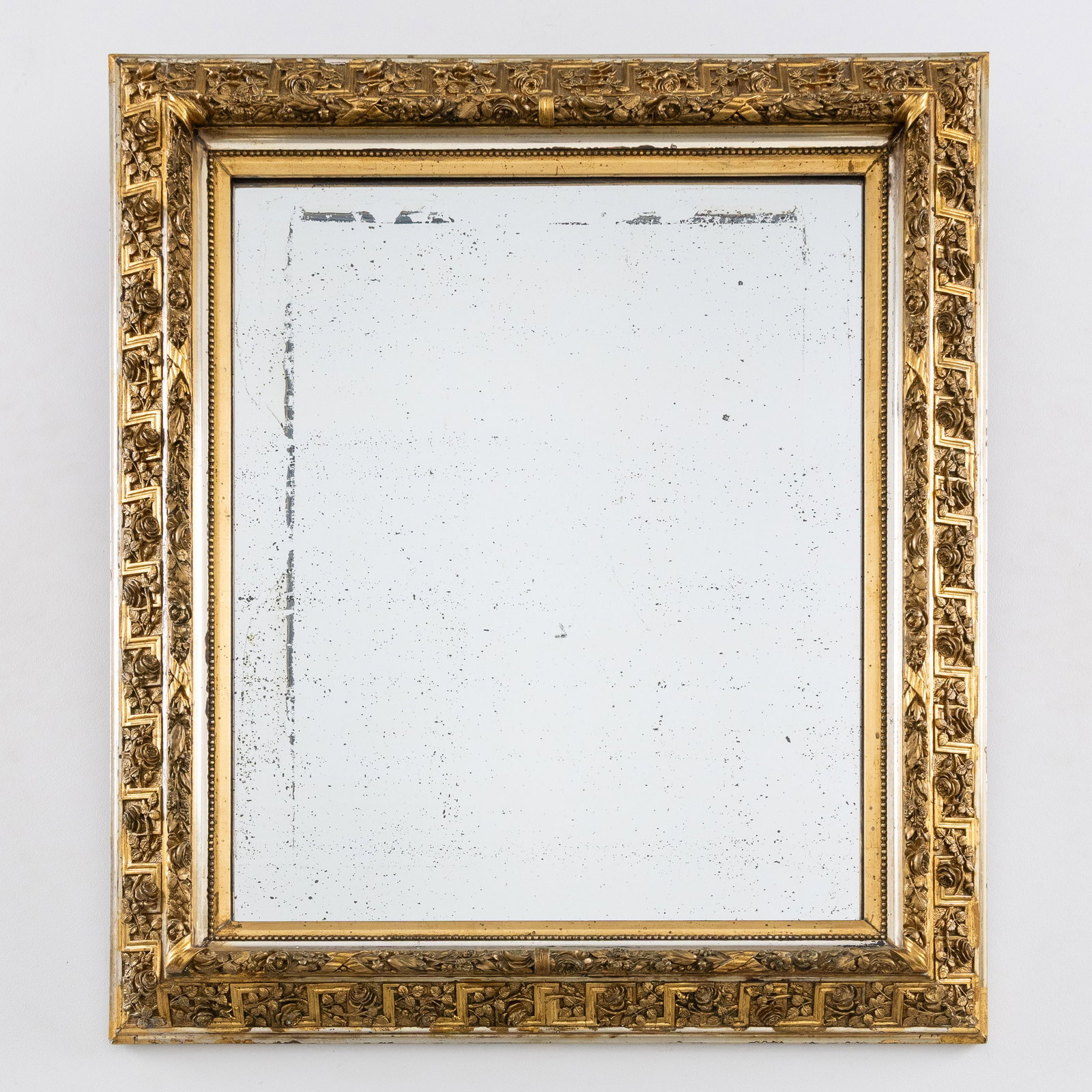 A wood-sculptured mirror, gilded and silvered wood, Louis XVI style, circa 1930. (1 of 6)