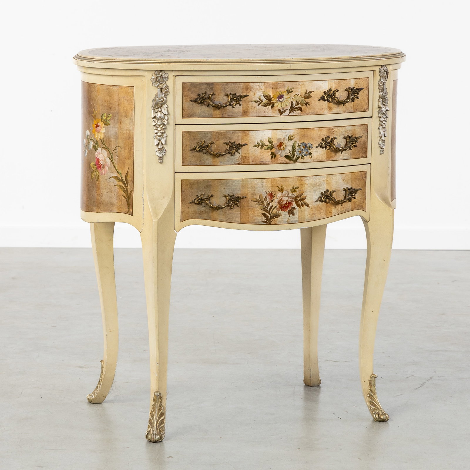 An Oval chest of drawers with hand-painted floral decoration, Louis XV style. (1 of 8)