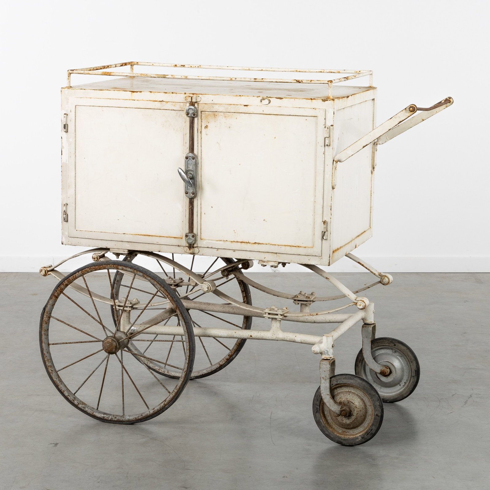 An Antique hospital trolley, patinated metal, to be converted into an original bar cabinet, early (1 of 9)