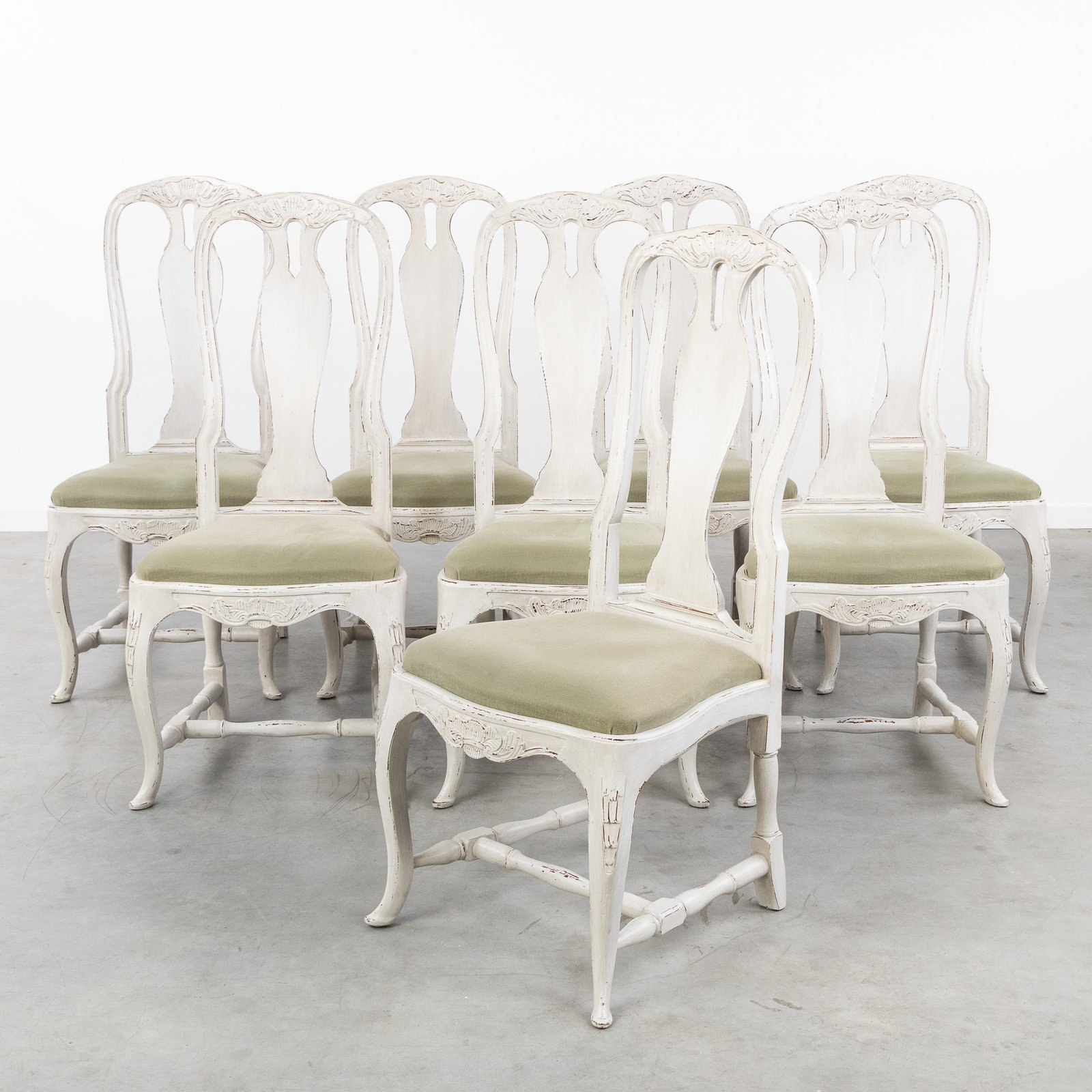 A Set of eight Gustavian dining chairs, sculptured and patinated wood, Swedish Rococo style. (1 of 4)