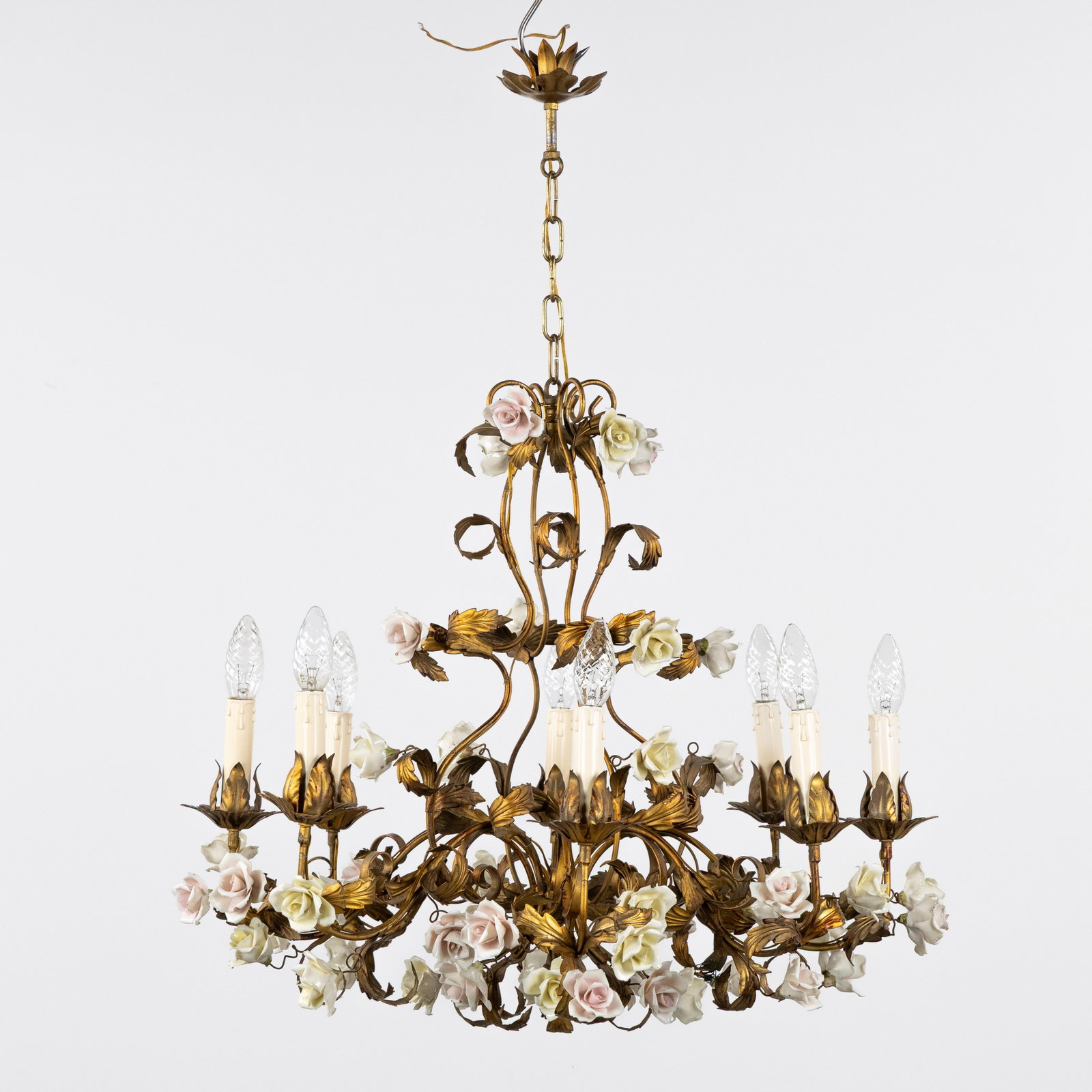 A Decorative chandelier with porcelain flowers, gilded metal. (1 of 6)