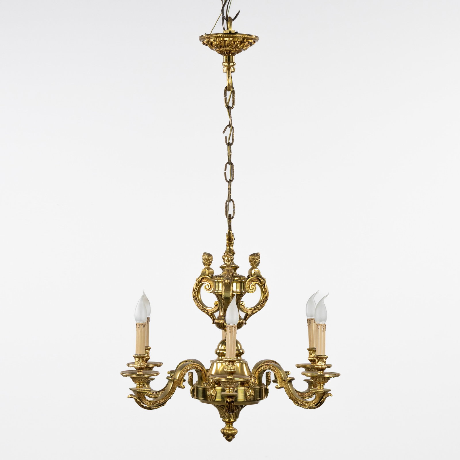 A Bronze 'Mazarin' chandelier, decorated with Children's heads and Women's heads, 20th C. (1 of 7)