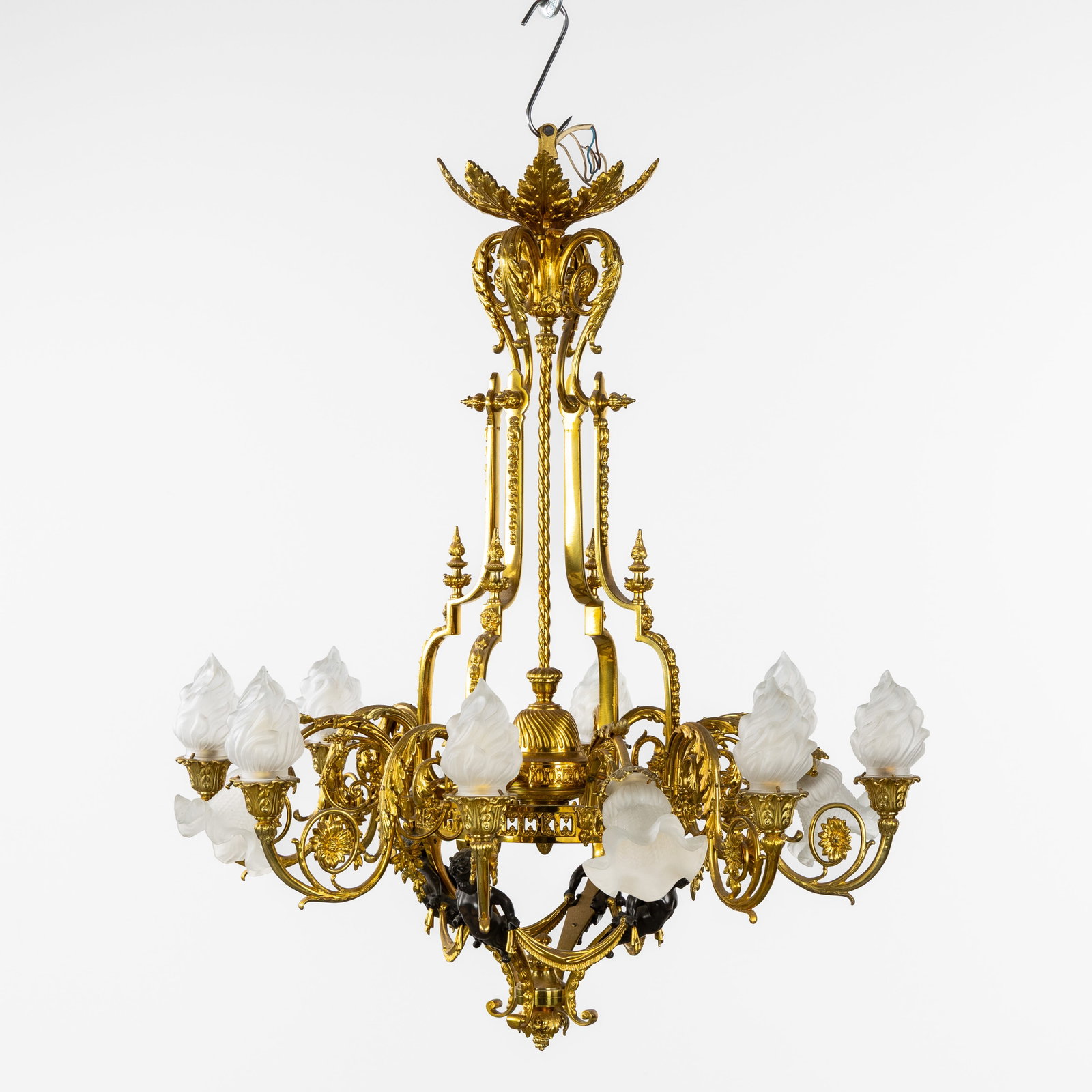 A large chandelier, gilt and patinated bronze and mounted with glass. France, circa 1920. (1 of 6)