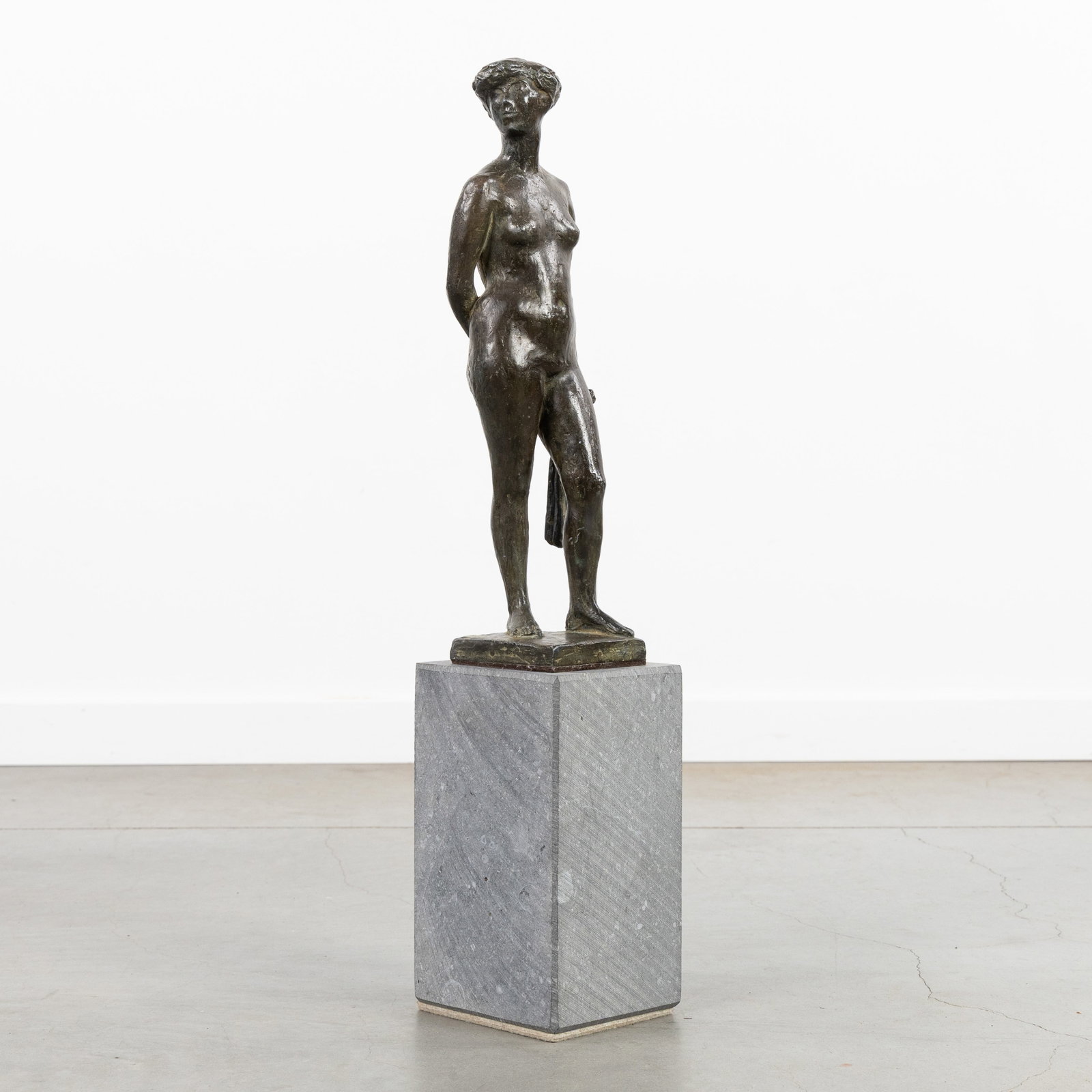 Russian School: 'Nude Lady', patinated metal, standing on a bluestone plinth.: Russian School: 'Nude Lady', patinated metal, standing on a bluestone plinth. Patinated metal.Unsigned, but by an unknown Russian artist. Height of bluestone plinth: 21 cm. Dimensions: (W:9 x H:35,5 x