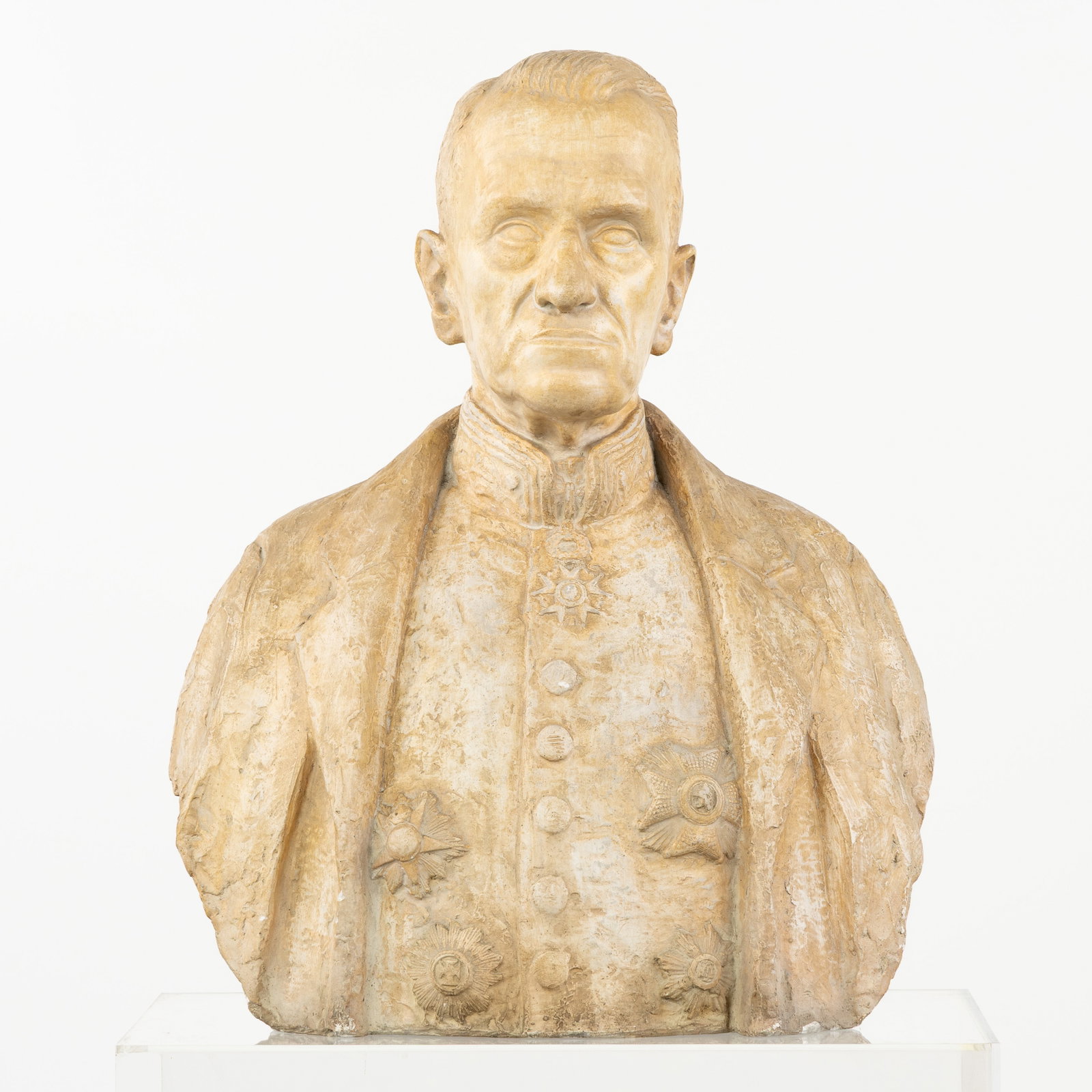 Geo Vindevogel (1923-1977) A Large bust of a notable man, decorated with honorable medals, patinated (1 of 9)