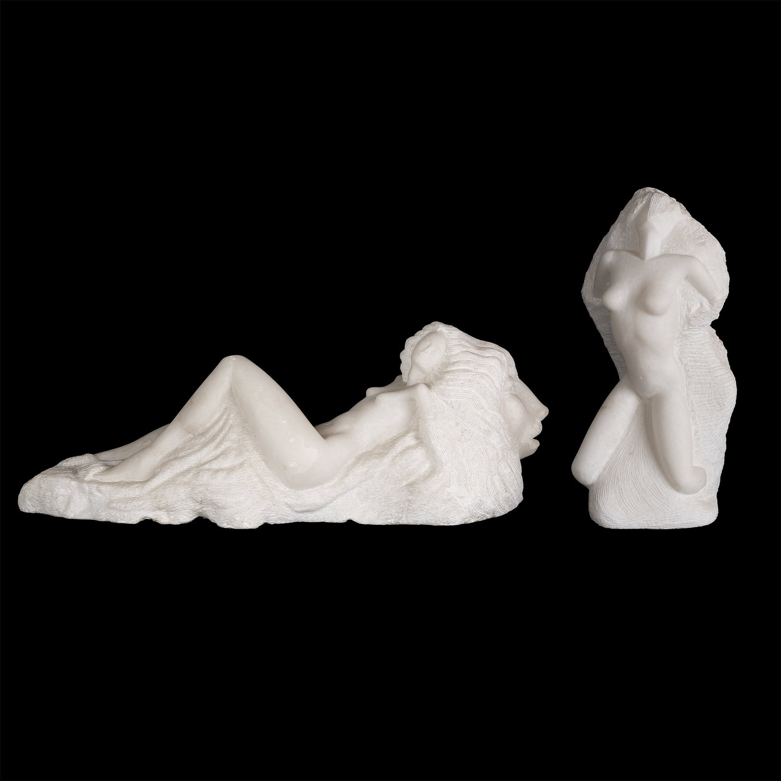 Two Carrara marble sculptures, 'Reclining Nude' and 'Nude', signed D. Nicolini. (1 of 13)
