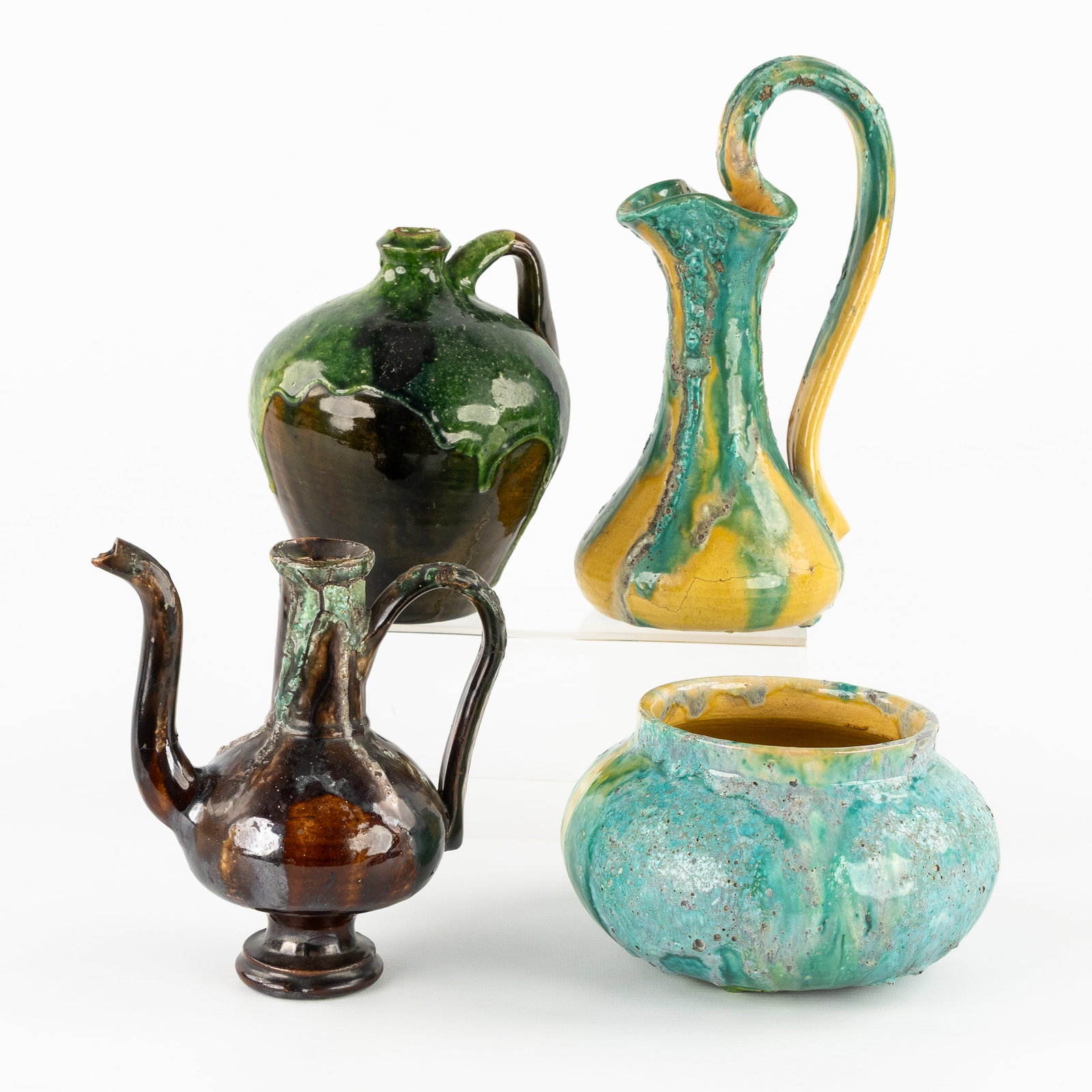 Arthur Craco (1869-1955) Two pitchers, a small jug, and a vase, glazed ceramics. (1 of 10)