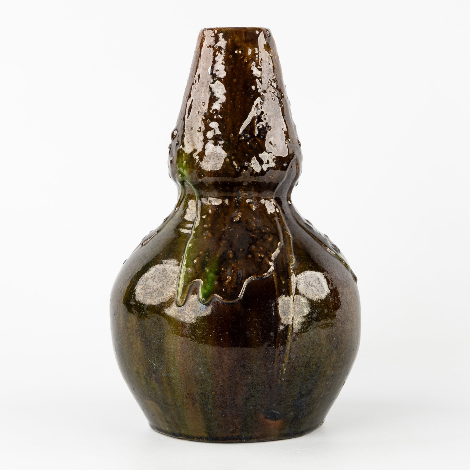 Arthur Craco (1868-1955) and Emile Declercq, a gourd-shaped vase with brown lava glazes, glazed: Arthur Craco (1868-1955) and Emile Declercq, a gourd-shaped vase with brown lava glazes, glazed ceramics, circa 1900. Brown glazed ceramics, finished with lava glaze.Gourd-shaped vase.Signed at the bo
