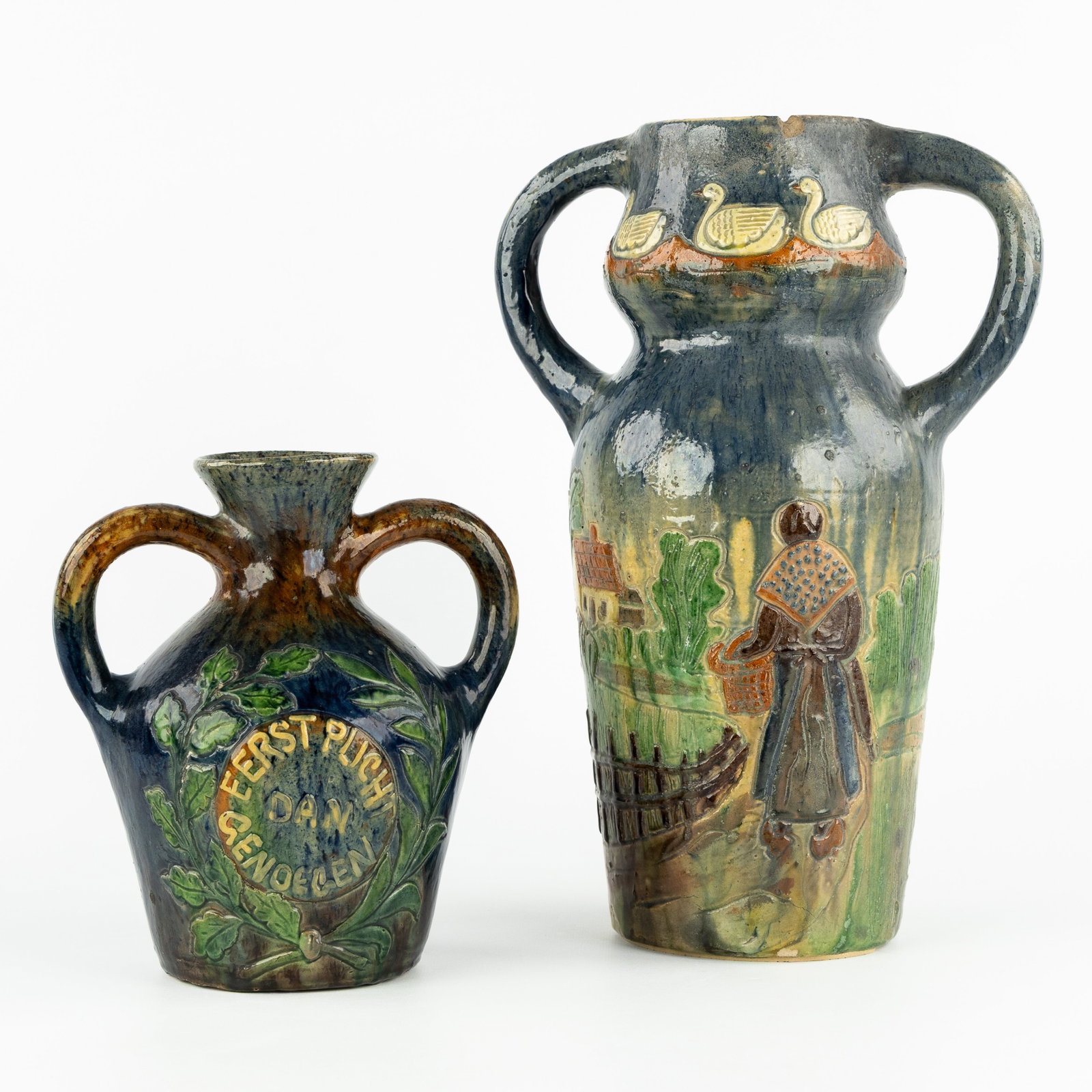 Torhout Pottery, two vases, decorated with a peasant woman in a landscape and a saying. Flemish (1 of 11)