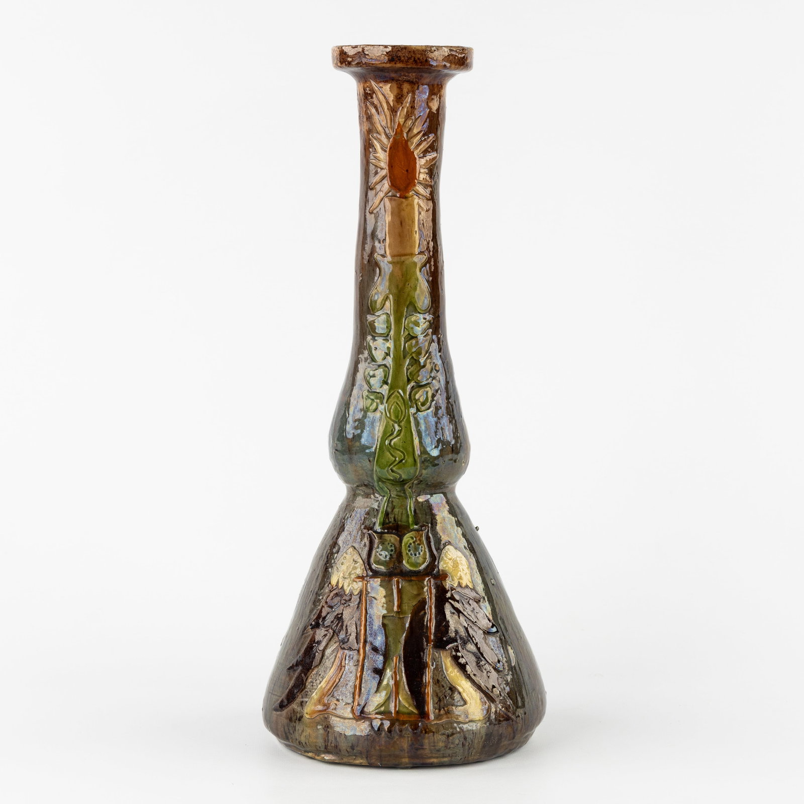 Leo Maes Vereenooghe (XIX-XX) 'Vase with owl and candle', Flemish earthenware, Torhout.: Leo Maes Vereenooghe (XIX-XX) 'Vase with owl and candle', Flemish earthenware, Torhout. Probably a figurative depiction of the saying 'Wat baten kaars en bril, als de uil niet zienen wil'.Depicting an