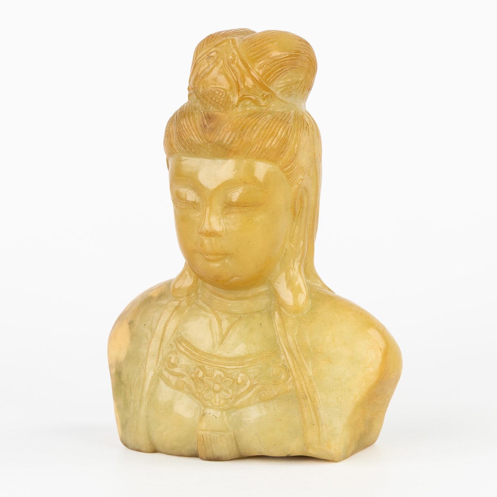 A Chinese bust of Guanyin, sculptured jade or soapstone, 19th/20th C. (1 of 7)