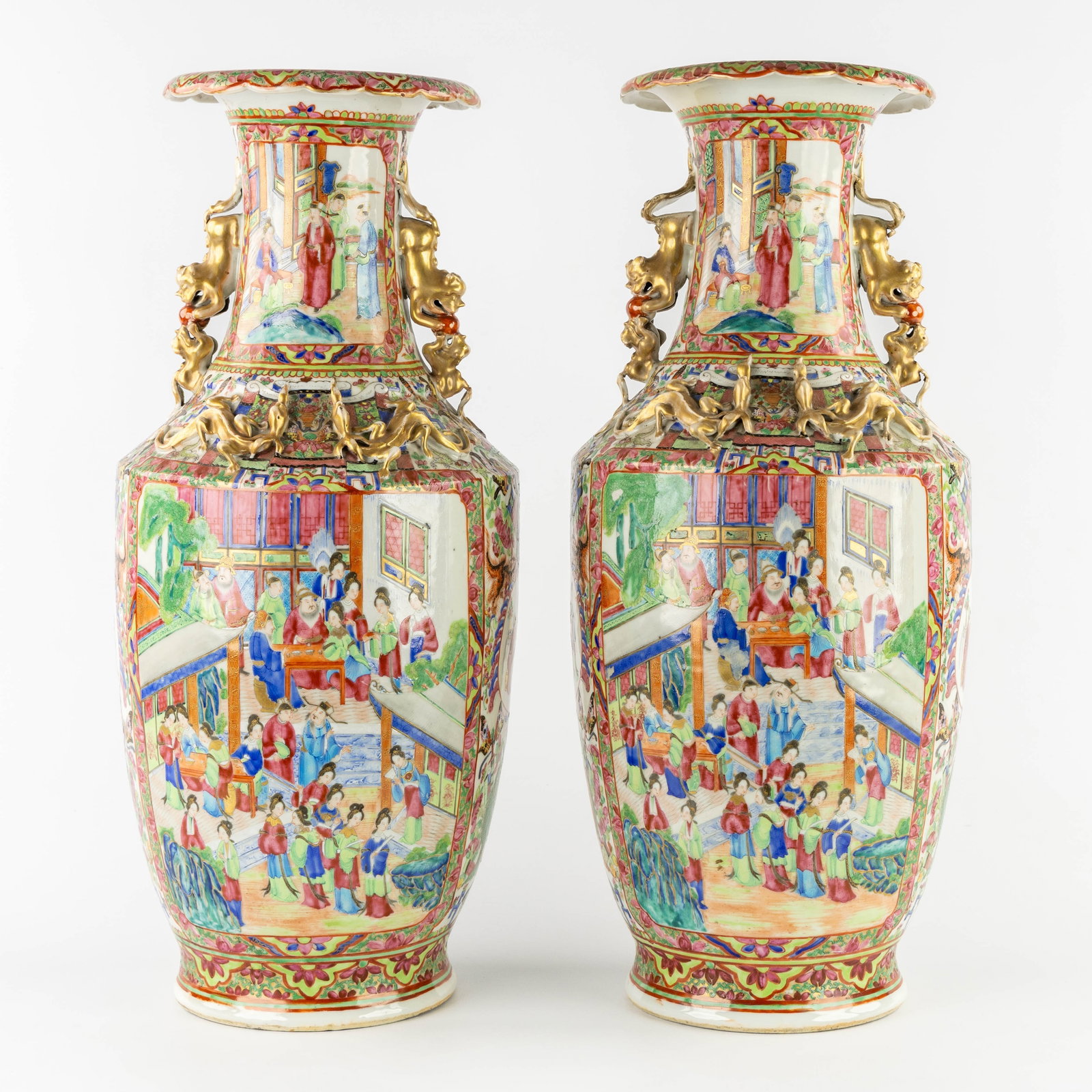 A pair of Chinese Canton Famille Rose vases, depicting palace scenes. 19th C. (1 of 6)