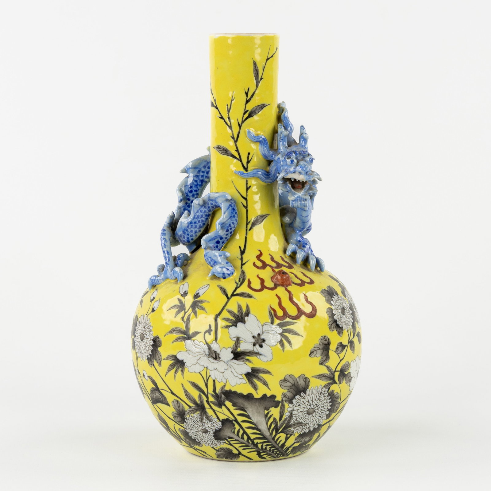 A Chinese vase with a relief dragon decor, marked Jiaqing. 19th/20th century. (1 of 9)