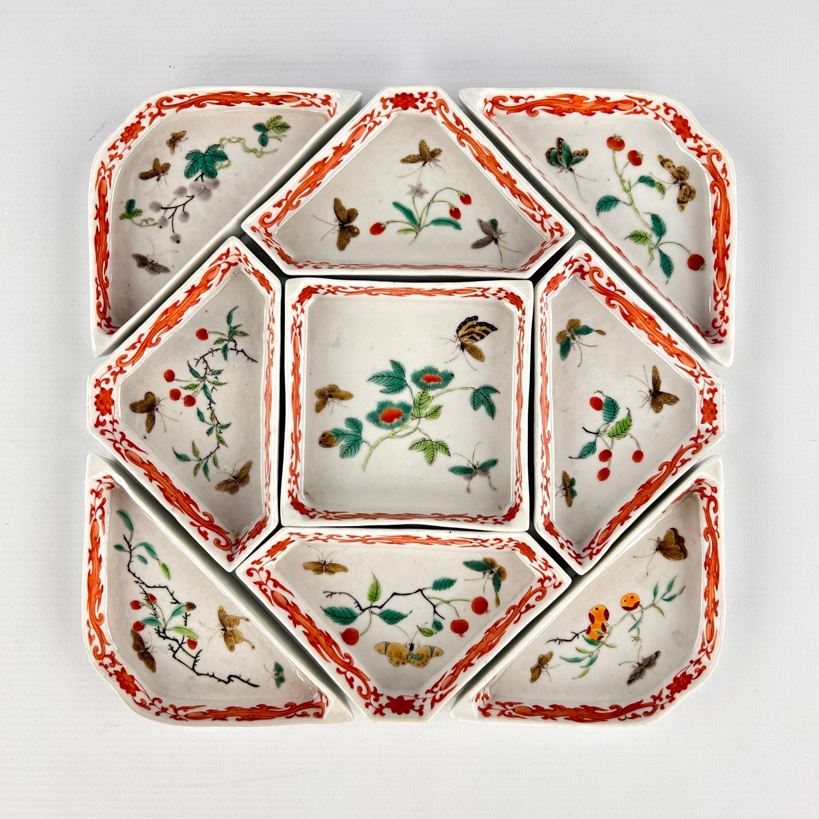 A Chinese set of 9 rice table bowls, decor of Butterflies and Fruits. 19th-20th C. (1 of 5)