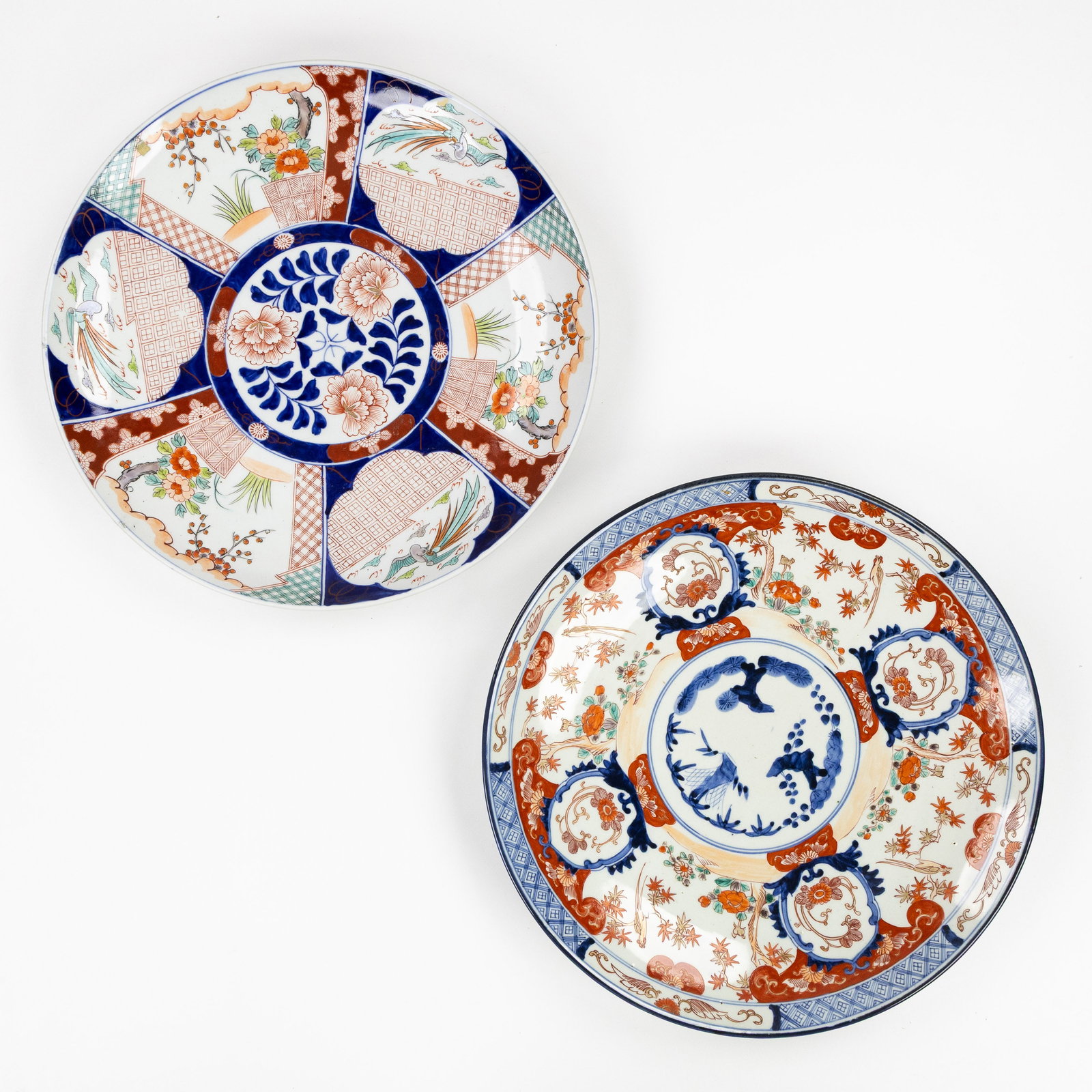 Two Large Japanese Imari plates, Edo/Meiji, 18th/19th C.: Two Large Japanese Imari plates, Edo/Meiji, 18th/19th century. Imari porcelain.Florally decorated with birds. Dimensions: (W:46,5 cm) The absence of a condition report does not imply a perfect item. P