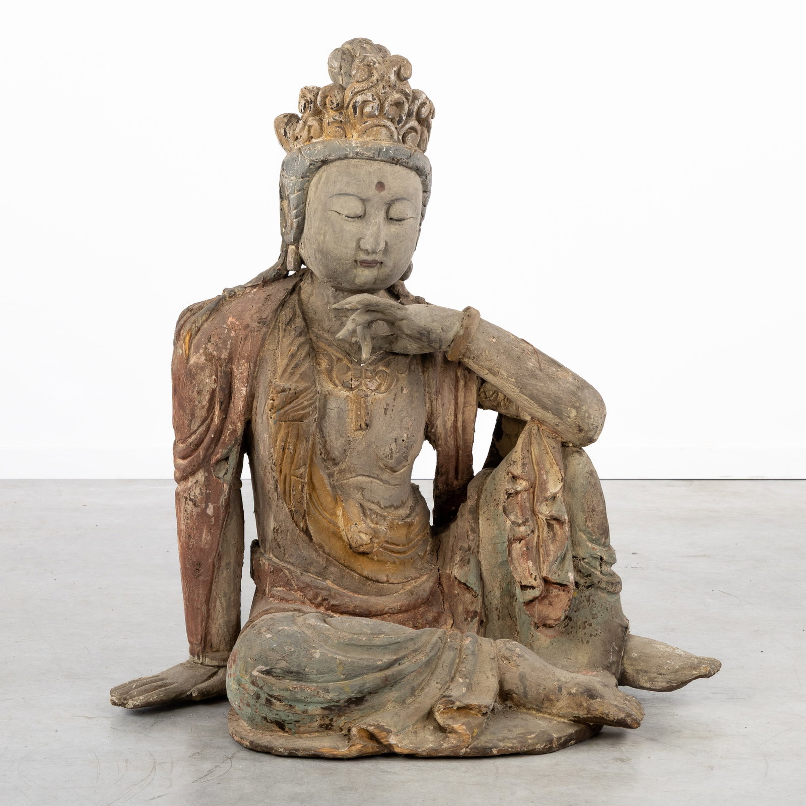 Guanyin Pusa (Avalokitesvara) in Maharajalilasana or 'Royal Ease' pose, a life-size wood-sculptured : Guanyin Pusa (Avalokitesvara) in Maharajalilasana or 'Royal Ease' pose, a life-size wood-sculptured statue. Sculptured and patinated wood.Guanyin, Guanyin Pusa, Guanshiyin, Avalokitesvara, Water-moon 