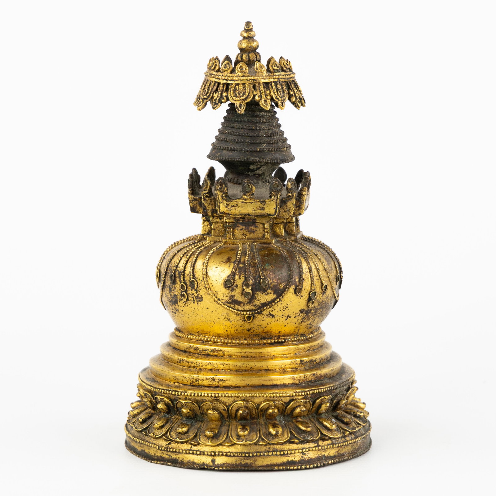 A Tibetan 'Stupa', gilt bronze. 18th C. (1 of 6)