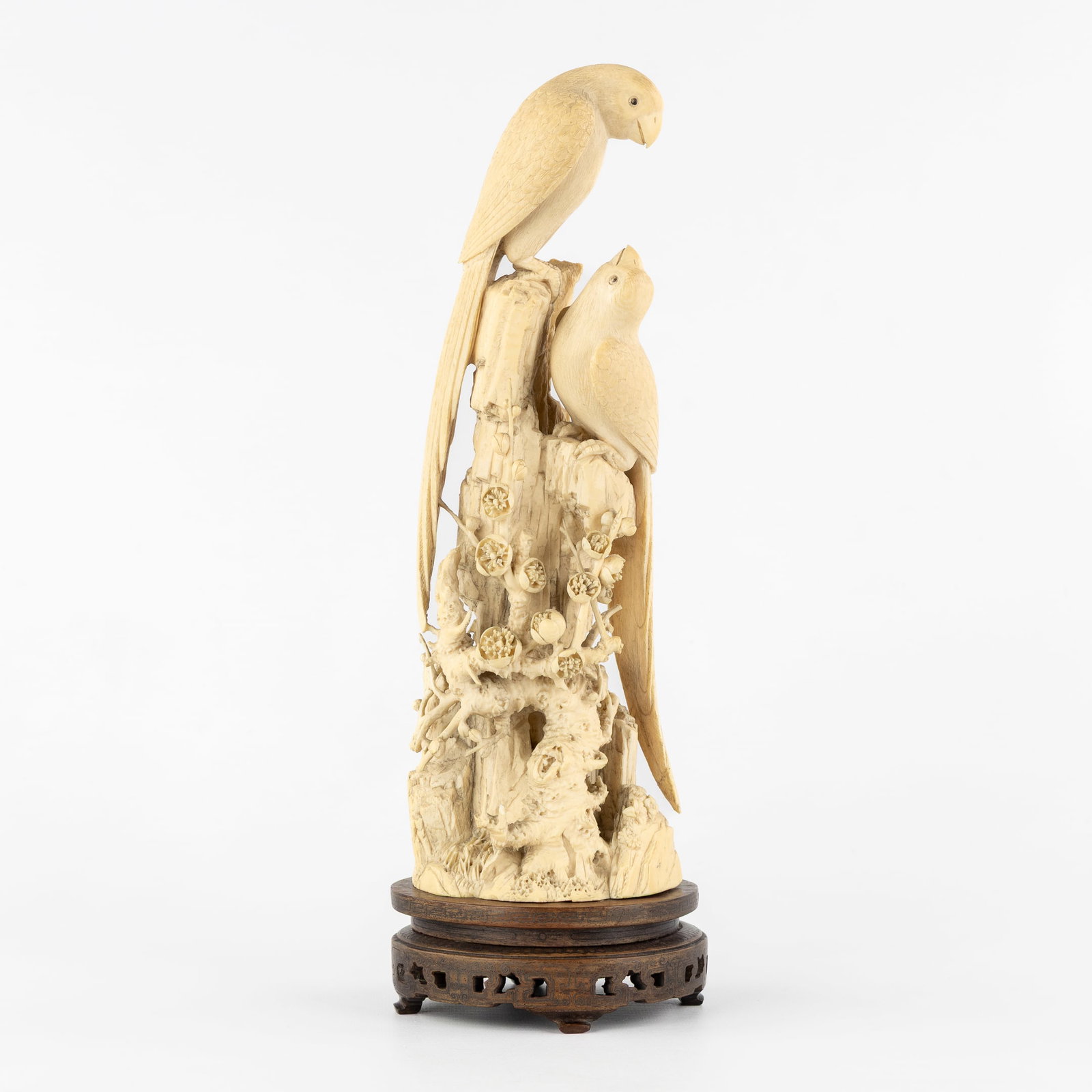 A Chinese ivory sculpture of 'Two Parrots'. China, late Qing Dynasty or Republic period. (1 of 9)