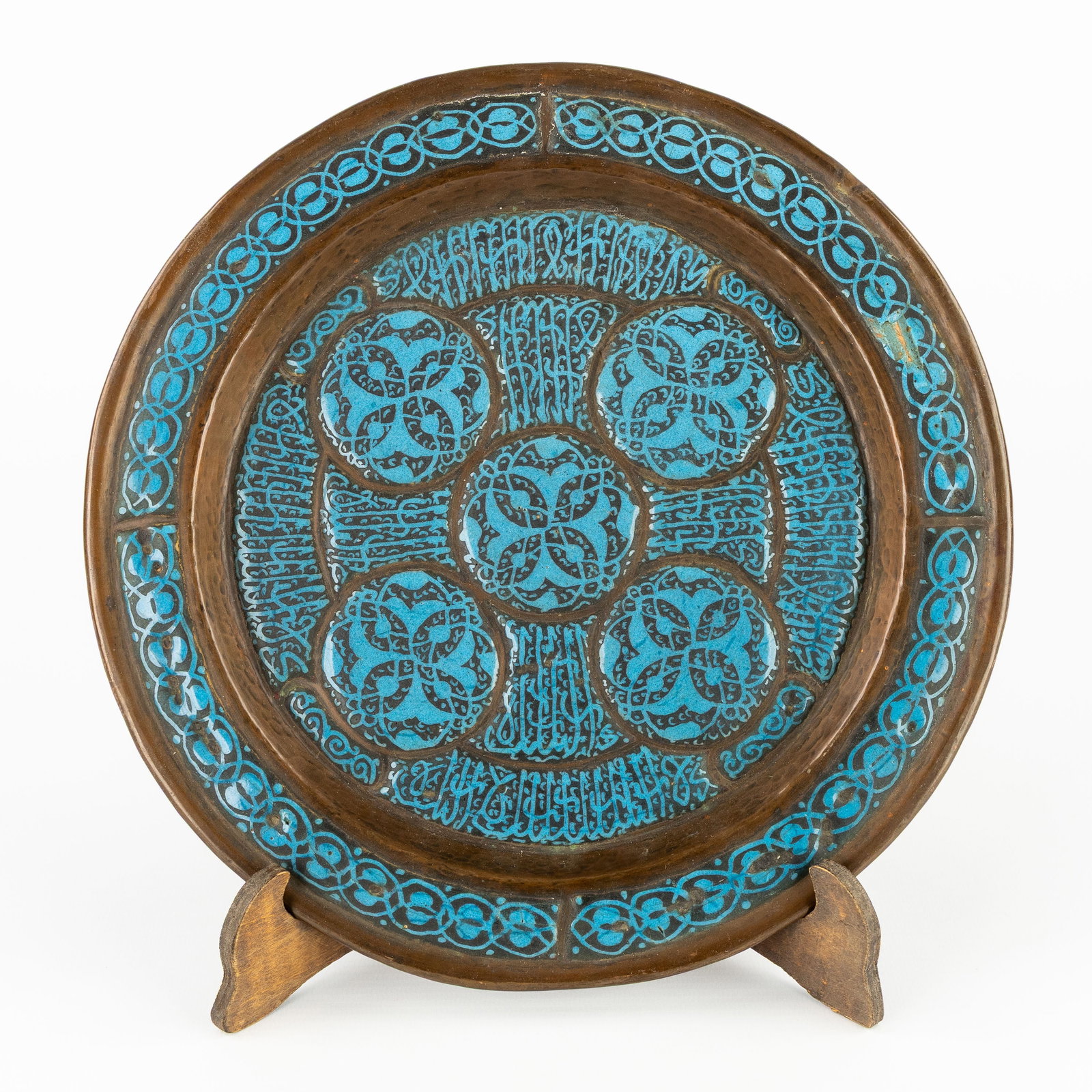 A Syrian 'Heena' plate with turquoise decoration, copper and enamel, probably Damascus, late 19th C. (1 of 5)