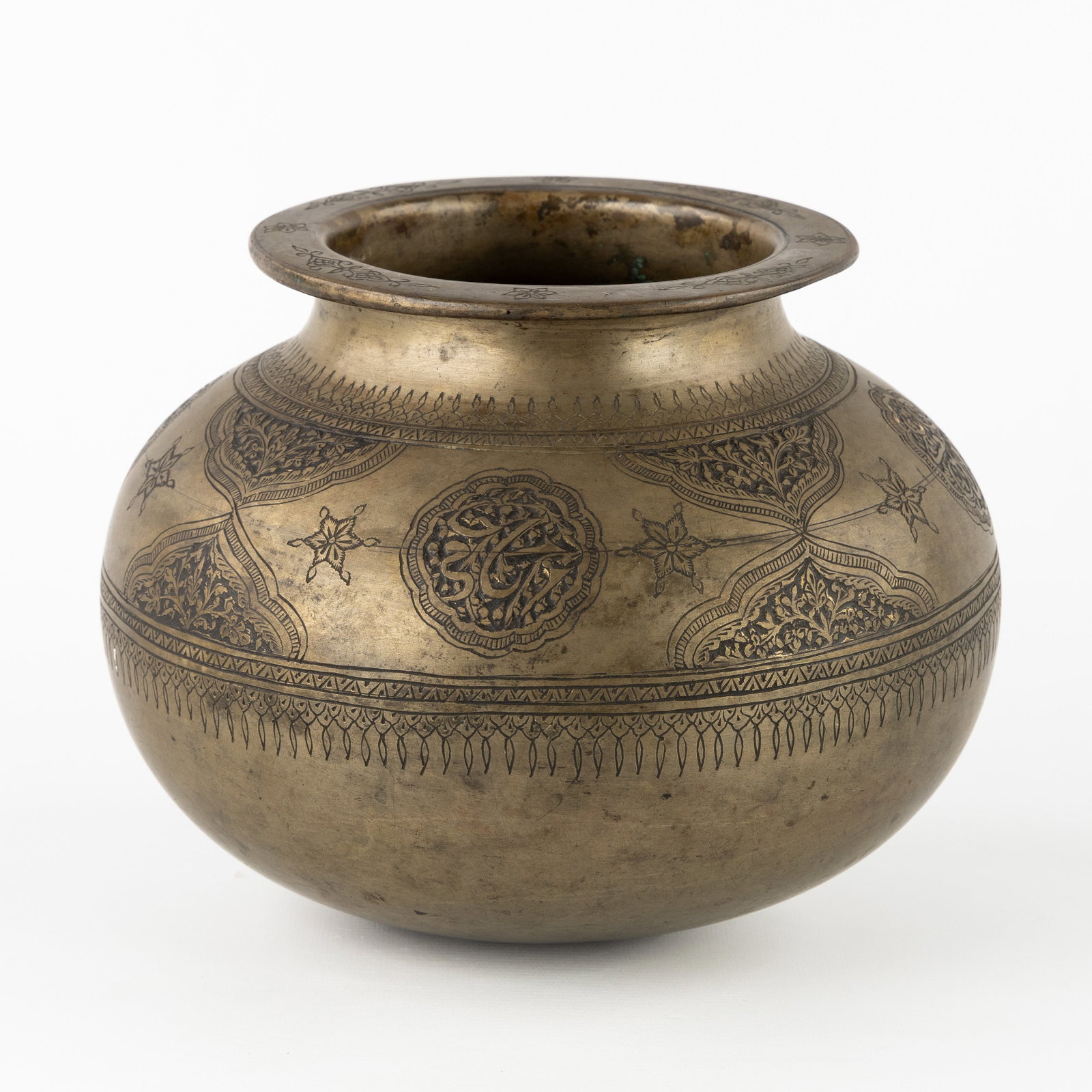 A Lota pot or bronze water jug, with engraved decorations. Middle East, probably Iran. (1 of 6)