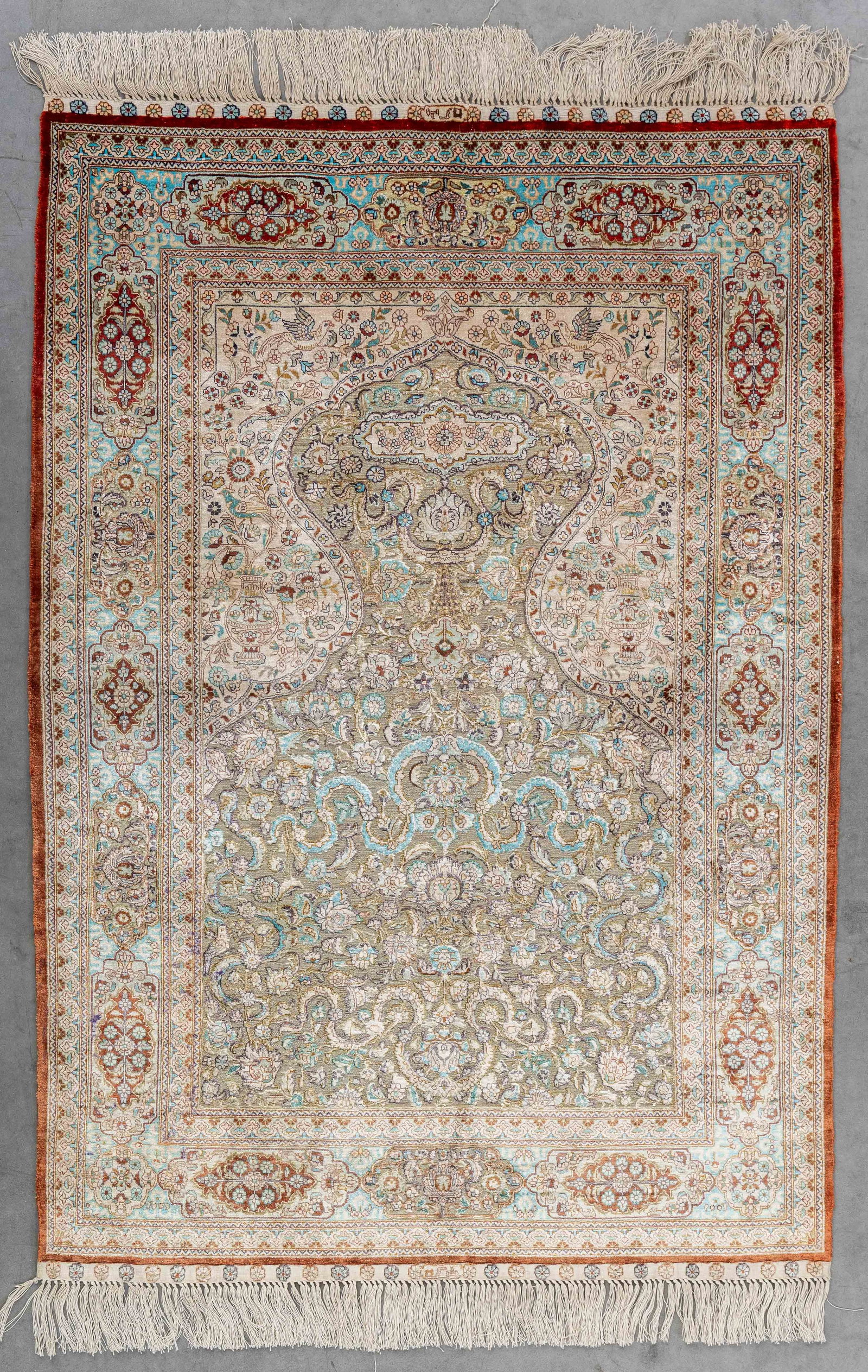 An Oriental hand-made carpet, Silk and Gold Thread, Hereke style, China (135 x 91 cm). (1 of 7)