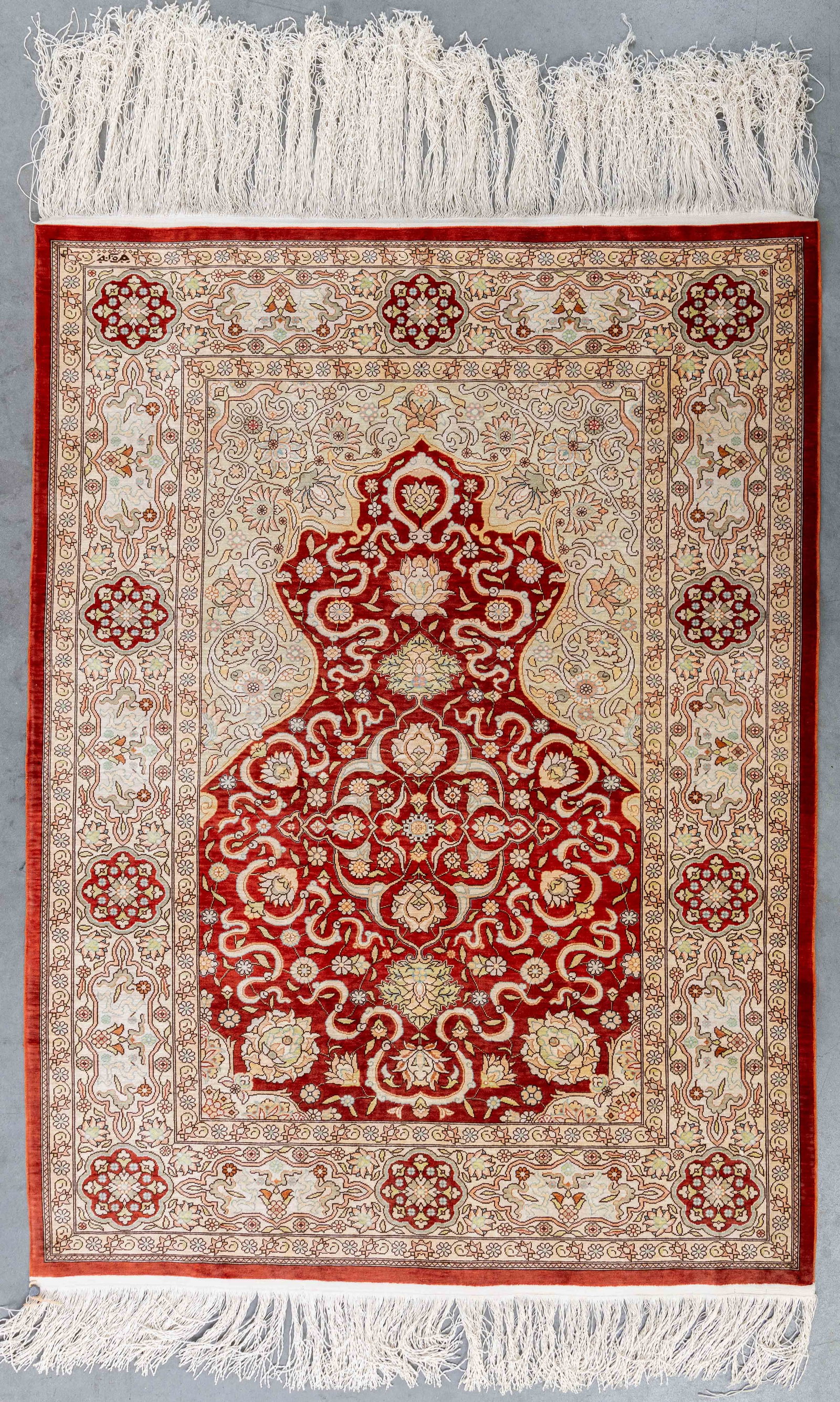 An Oriental handmade carpet, Silk, Hereke, Turkiye (98 x 73 cm). (1 of 6)