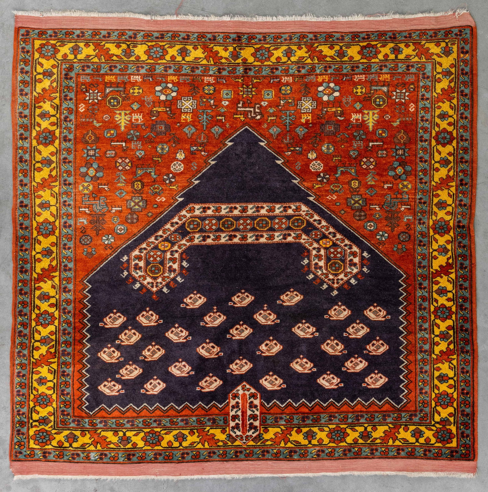 An Oriental handmade carpet, Ghoochan, Iran (109 x 117 cm). (1 of 5)