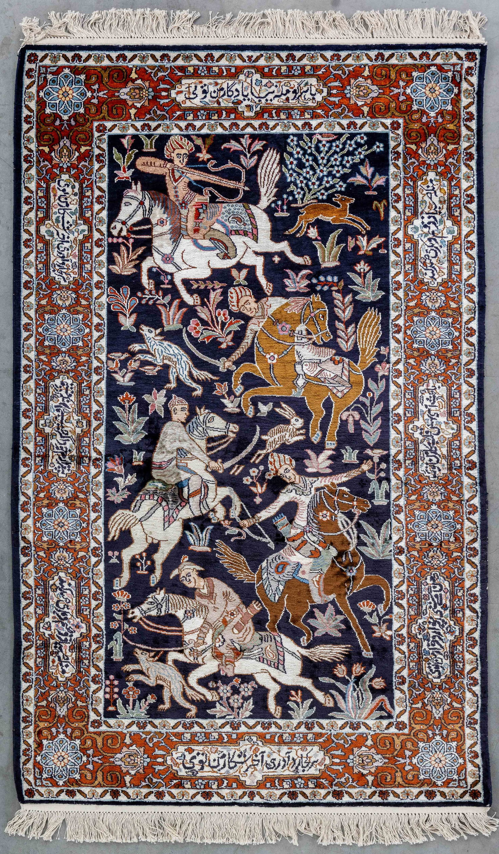 An Oriental handmade figurative carpet, silk, Kashmir, India (156 x 95 cm).: An Oriental handmade figurative carpet, silk, Kashmir, India (156 x 95 cm). Dimensions: (W:95 x H:156 cm) The absence of a condition report does not imply a perfect item. Please send us an e-mail to r