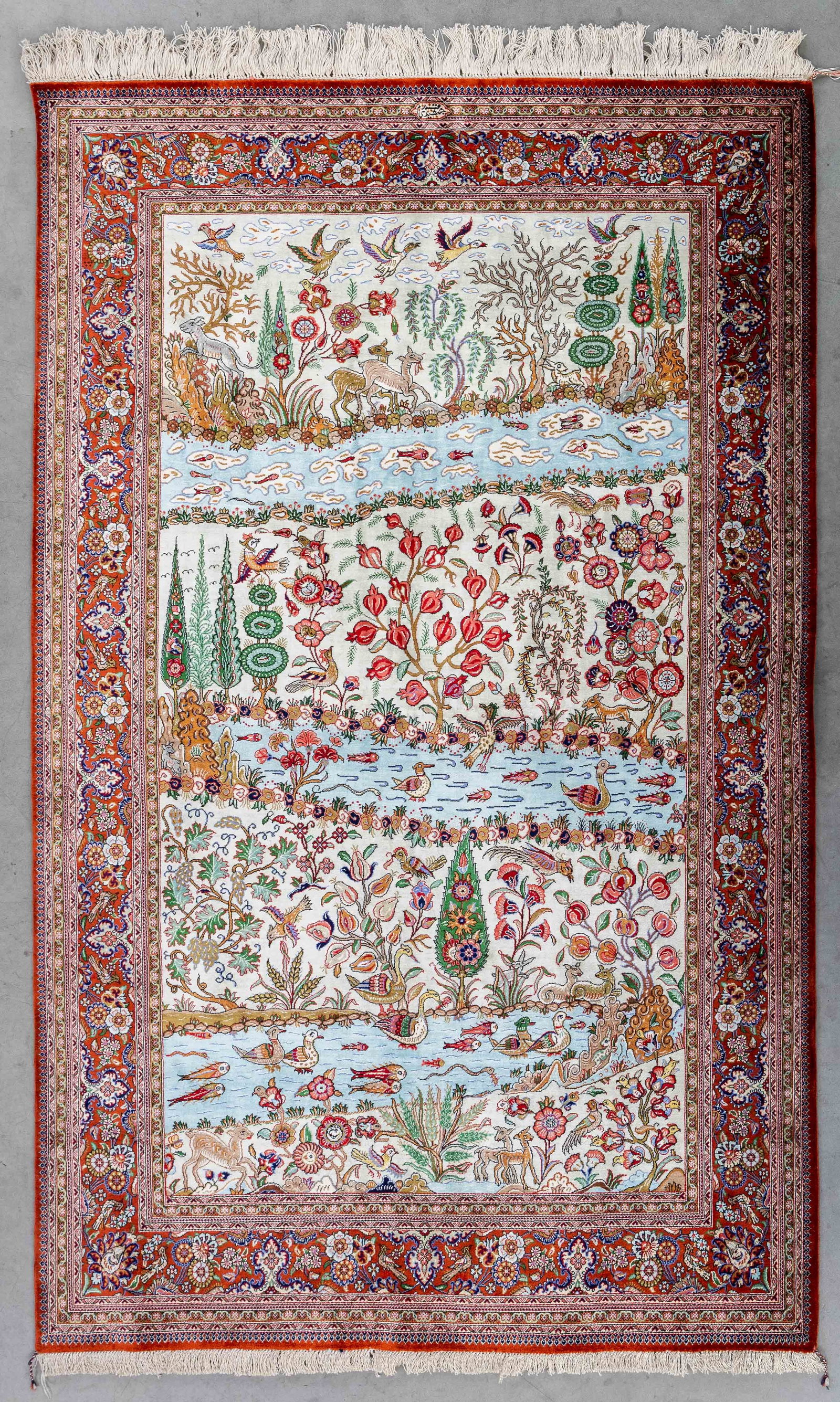 An Oriental handmade carpet, Fauna and Flora decor, Silk, Ghoum, Iran (169 x 105 cm). (1 of 7)