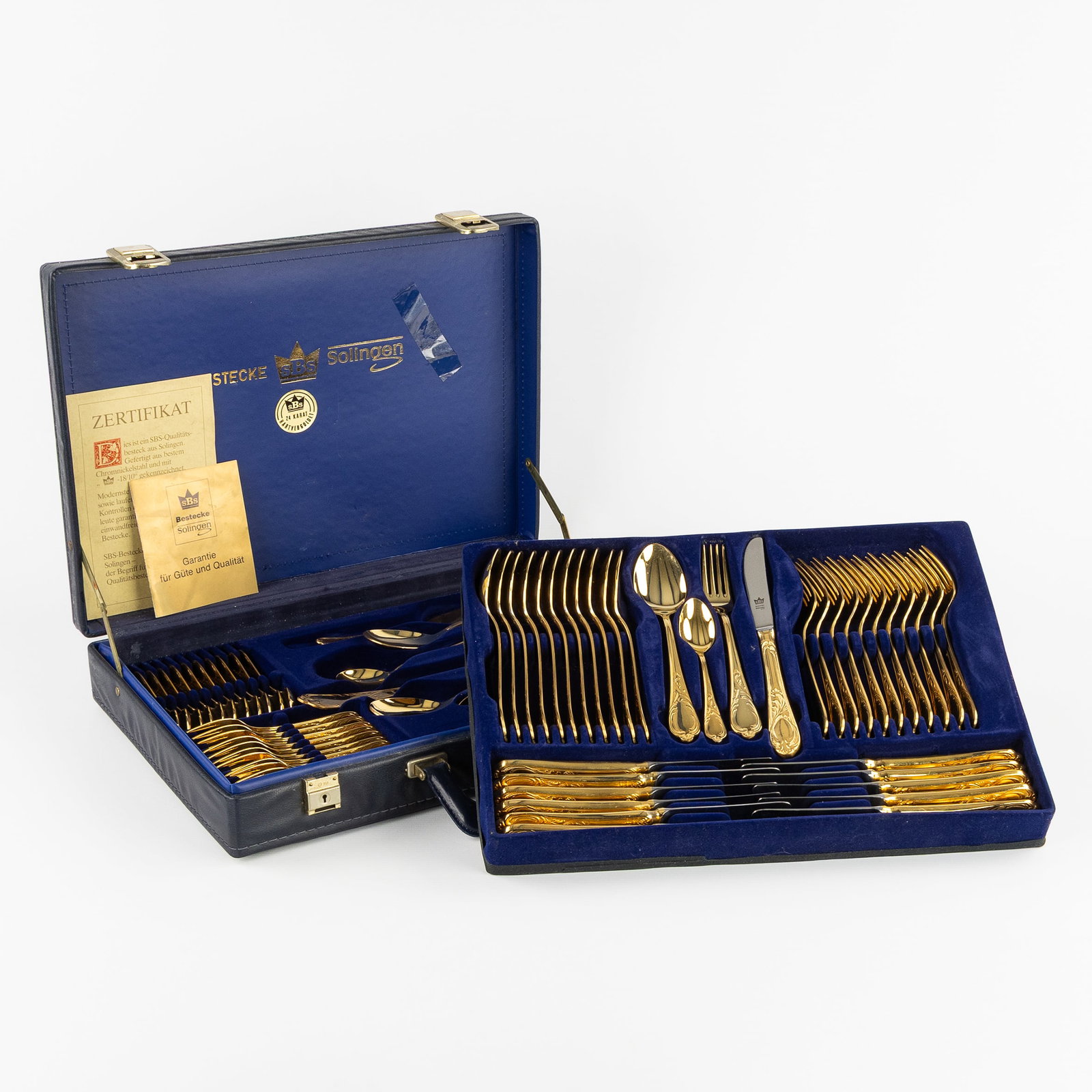 SBS Solingen Collection, a 70-piece gold-plated cutlery set, Louis XV style, in a case, Germany. (1 of 4)