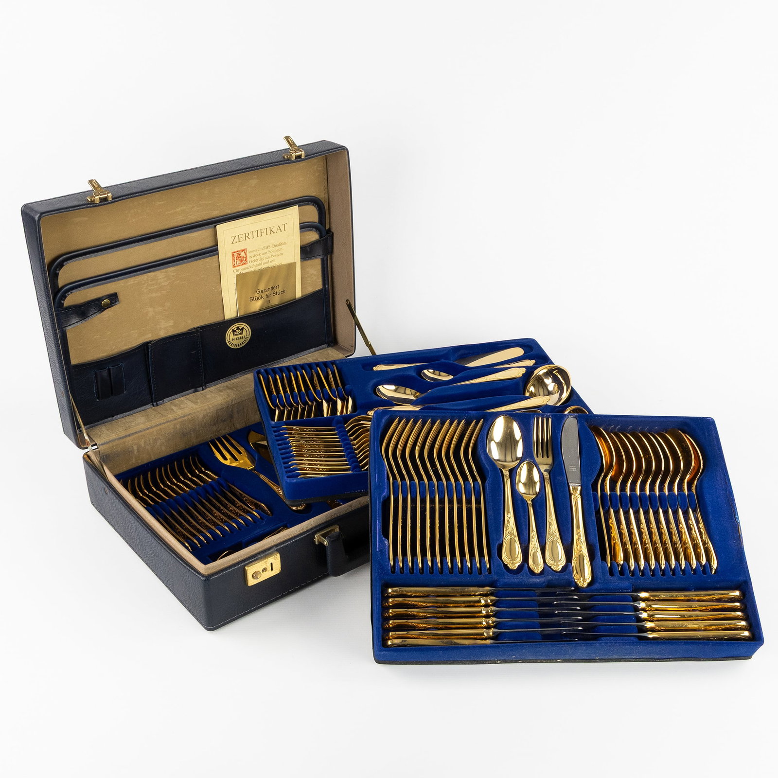 SBS Solingen Collection, a 108-piece gold-plated cutlery set, Louis XV style, in a case, Germany. (1 of 5)